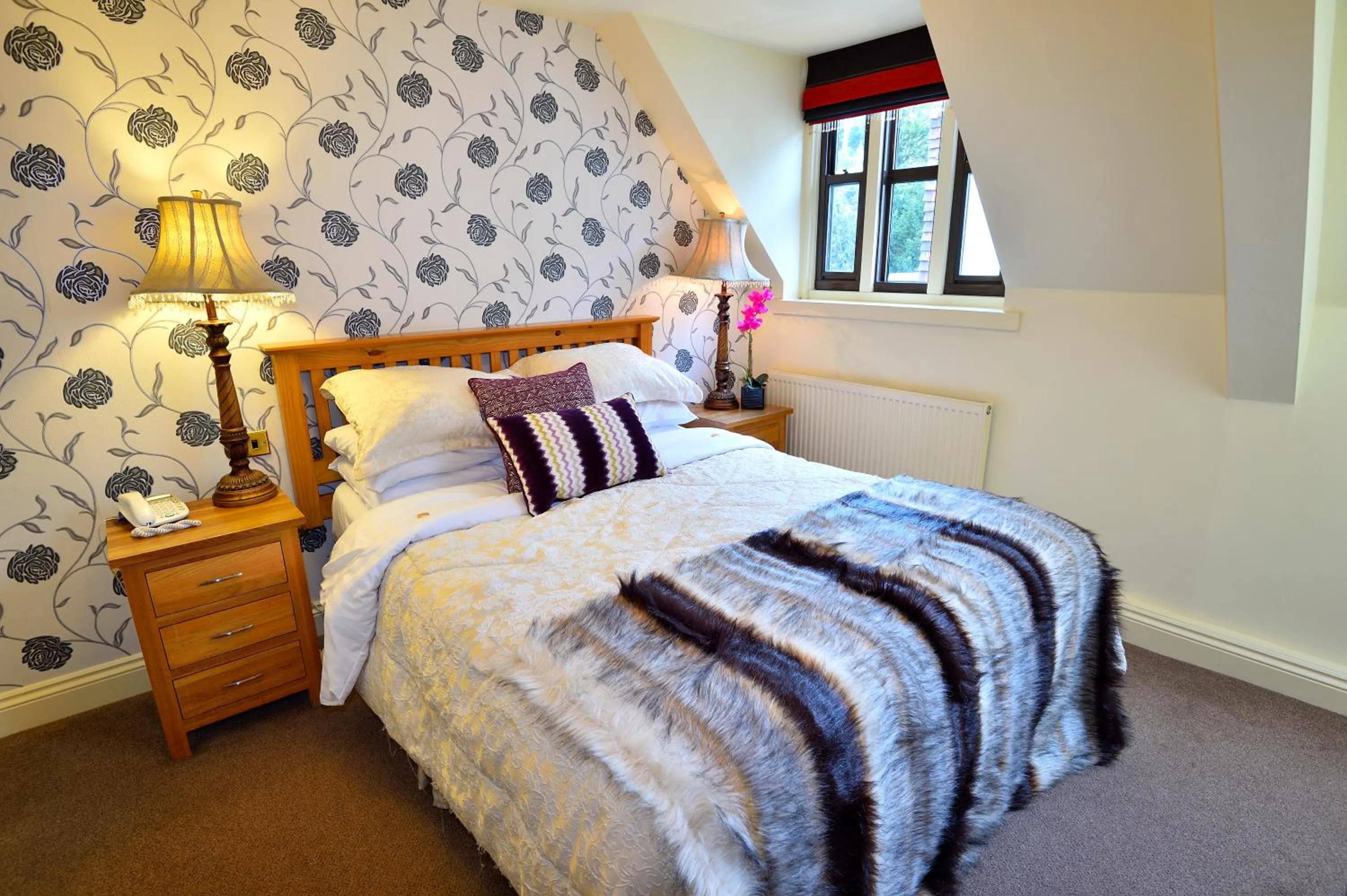 Bed in Angmering Manor Hotel