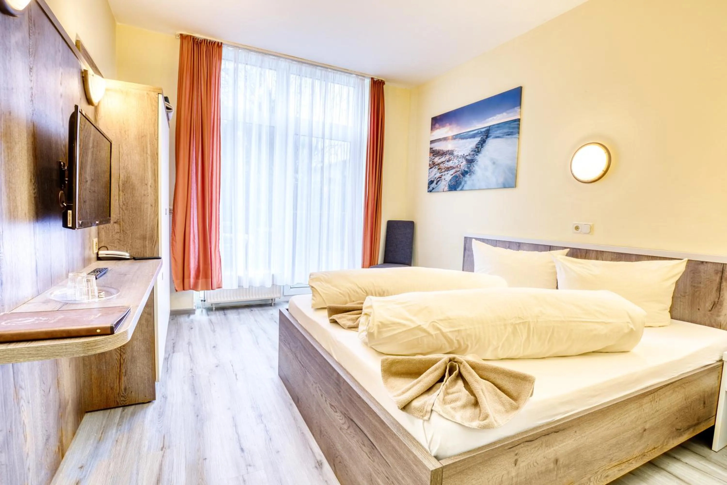 Bed in Hotel Kiebitz an der Ostsee