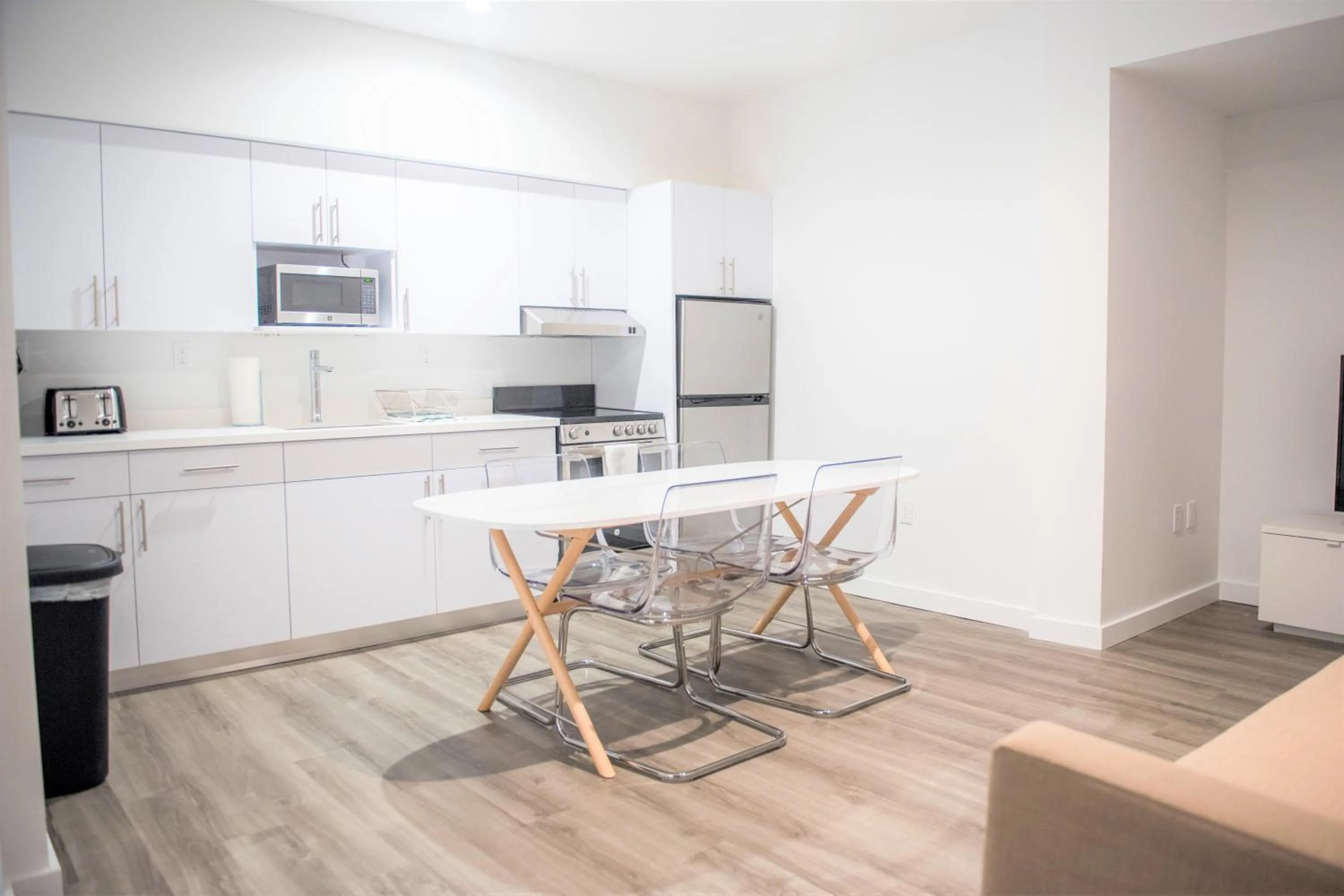 Kitchen/Kitchenette in 12th & Ocean Suites by LuxUrban