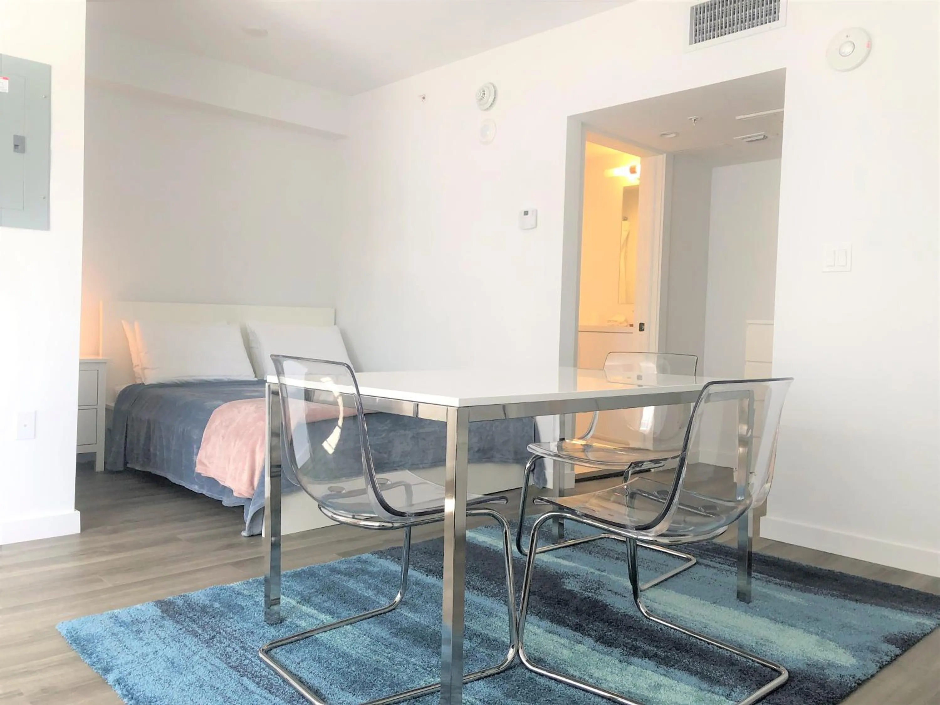 Dining Area in 12th & Ocean Suites by LuxUrban