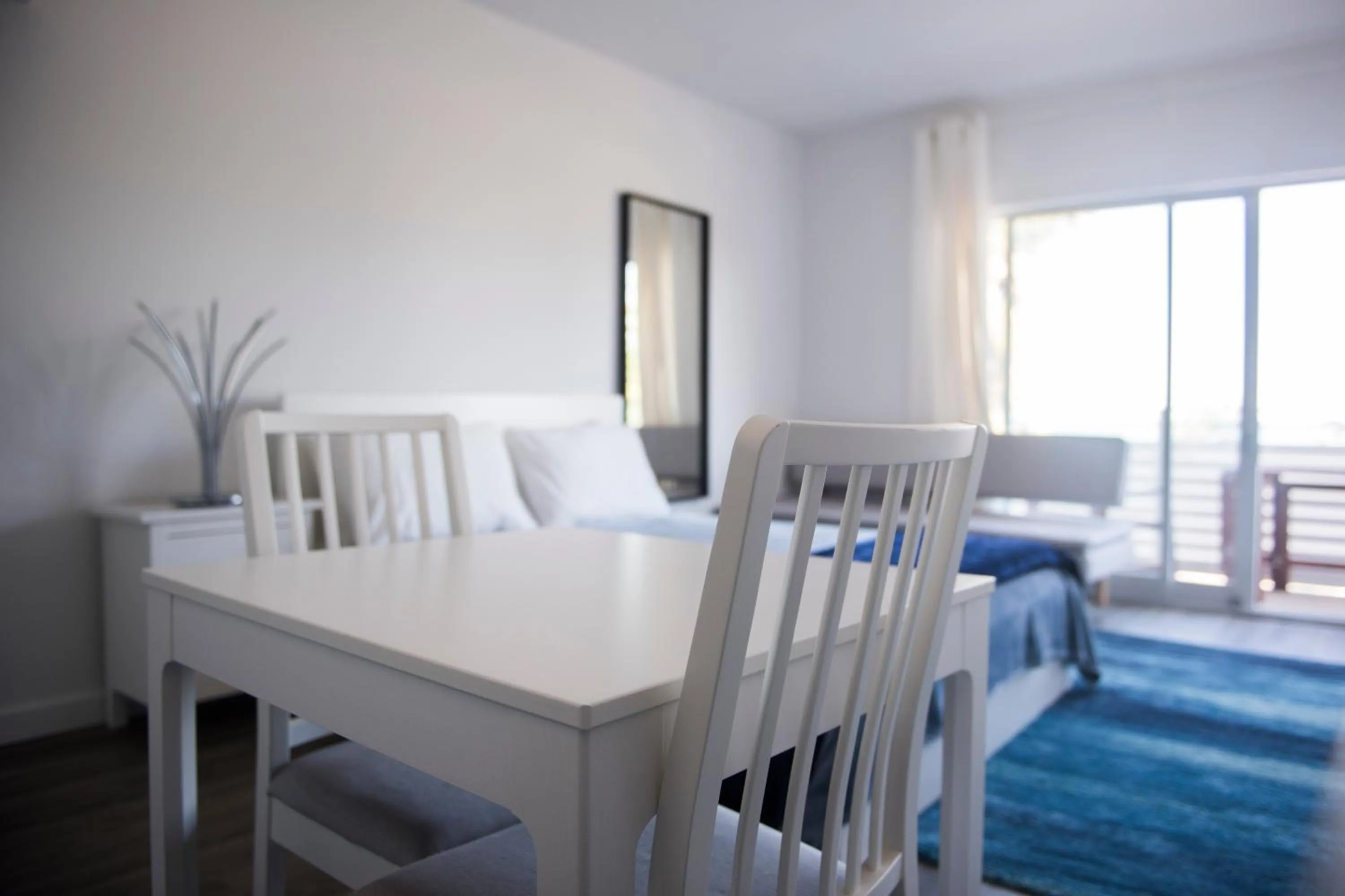 Seating Area in 12th & Ocean Suites by LuxUrban