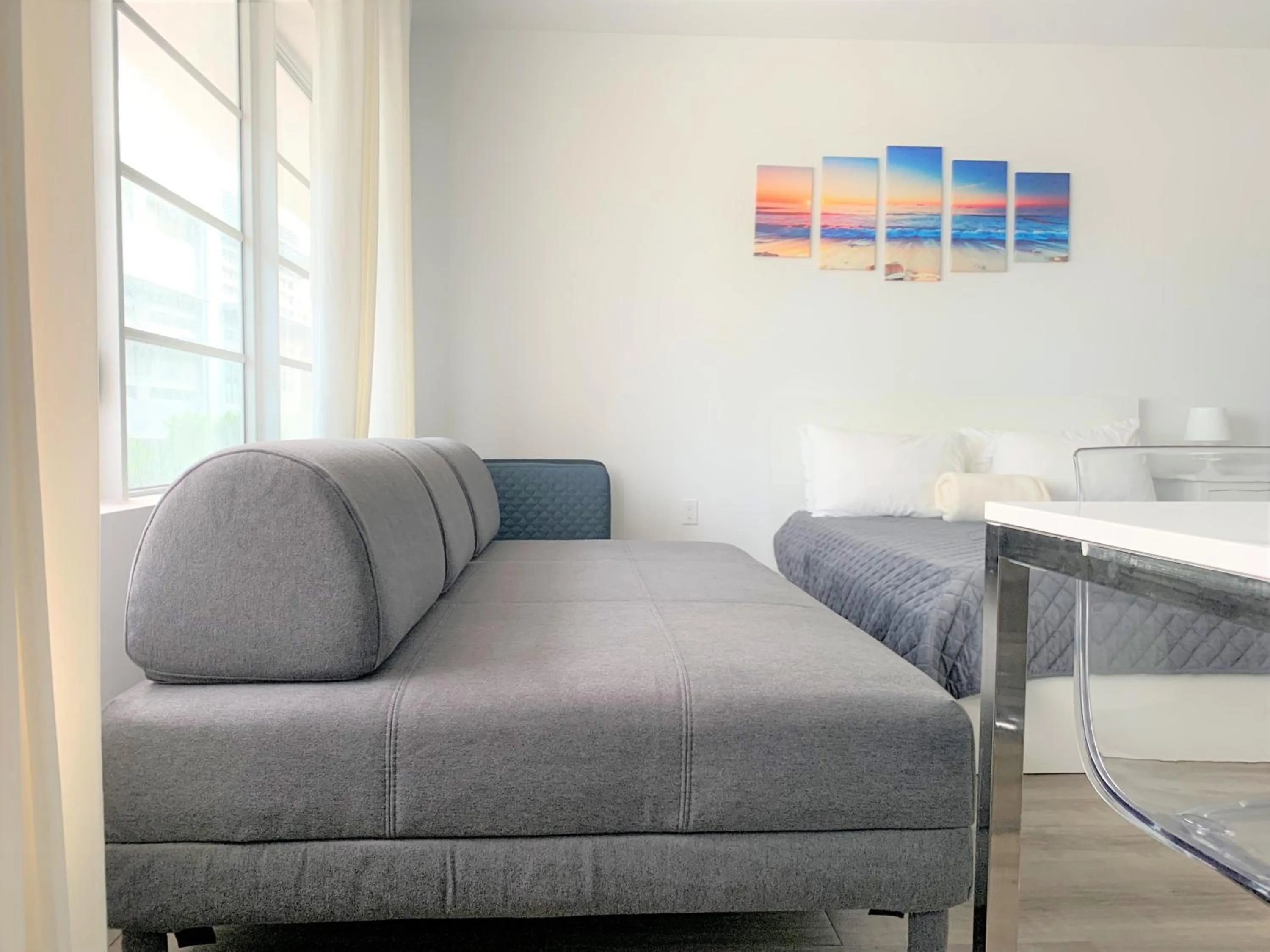 Seating Area in 12th & Ocean Suites by LuxUrban