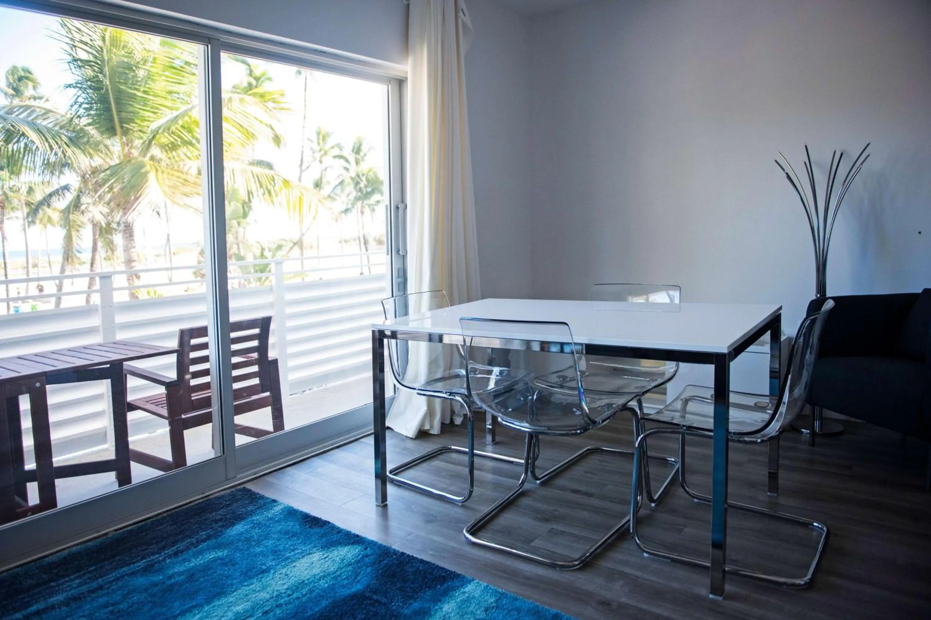 Photo of the whole room, Dining Area in 12th & Ocean Suites by LuxUrban