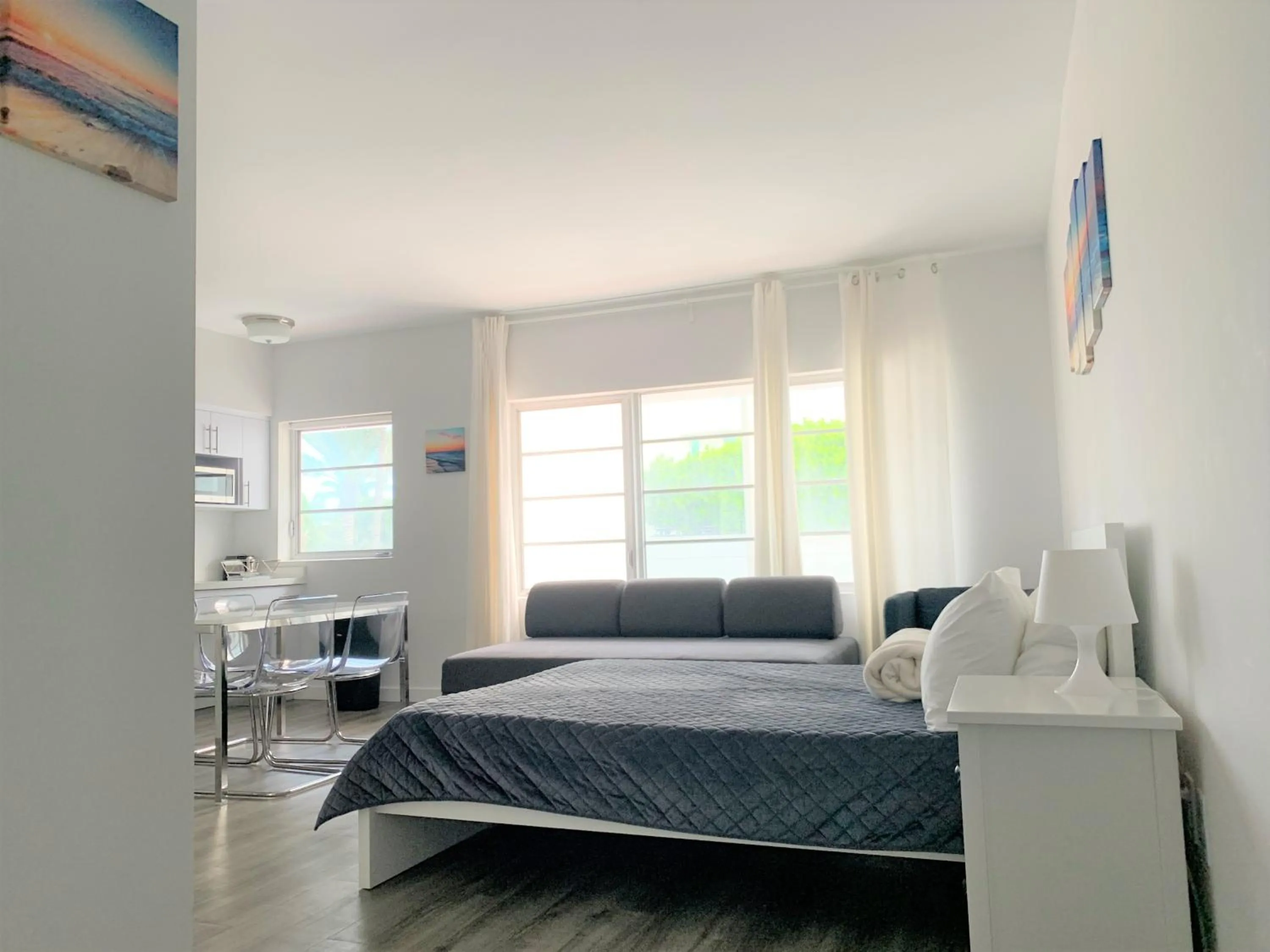 Seating Area in 12th & Ocean Suites by LuxUrban