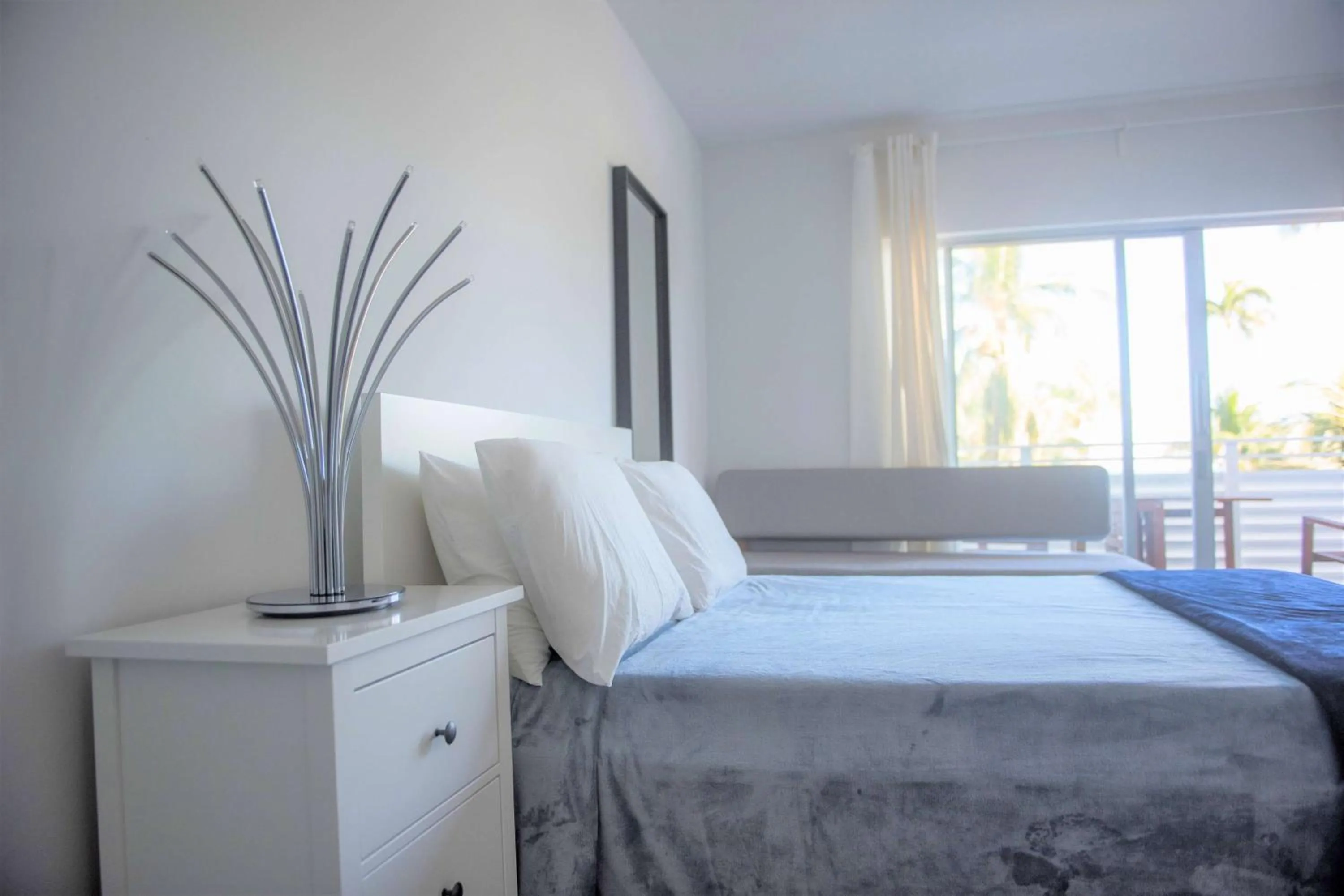 Photo of the whole room in 12th & Ocean Suites by LuxUrban