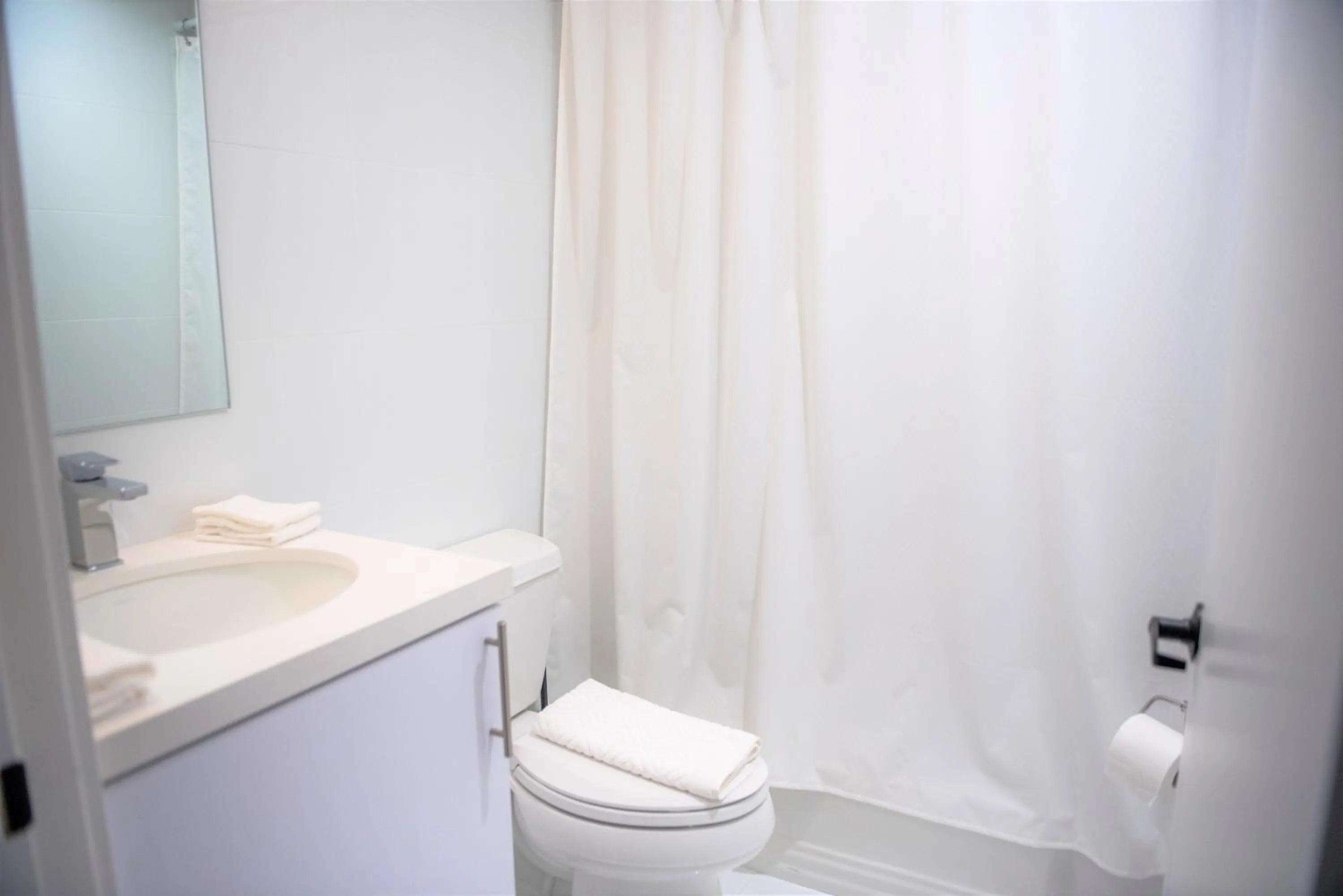 Bathroom in 12th & Ocean Suites by LuxUrban