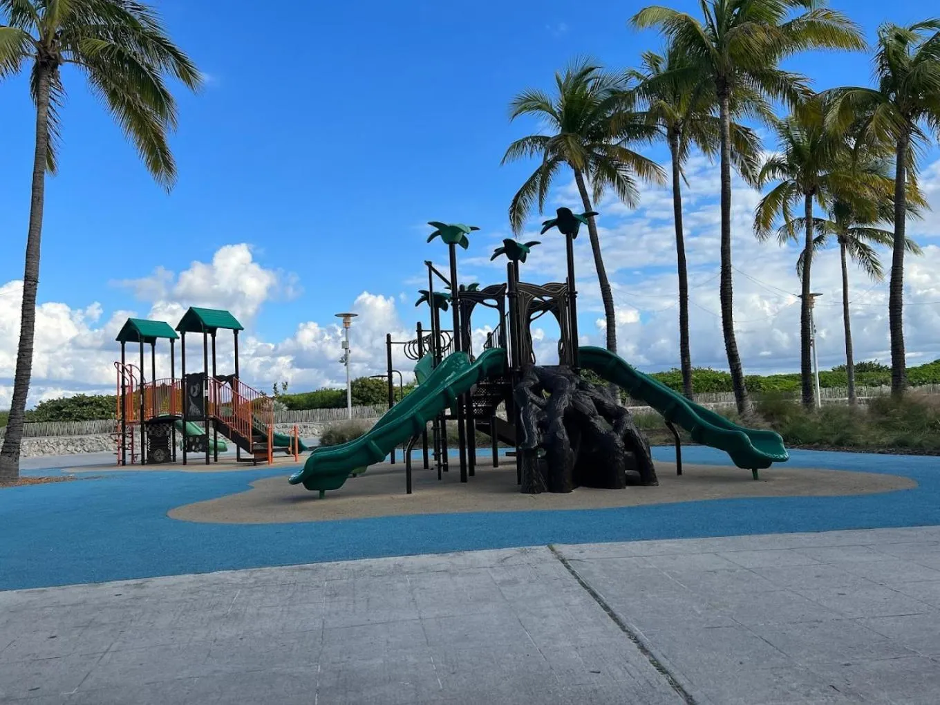 Children play ground, Children's Play Area in 12th & Ocean Suites by LuxUrban