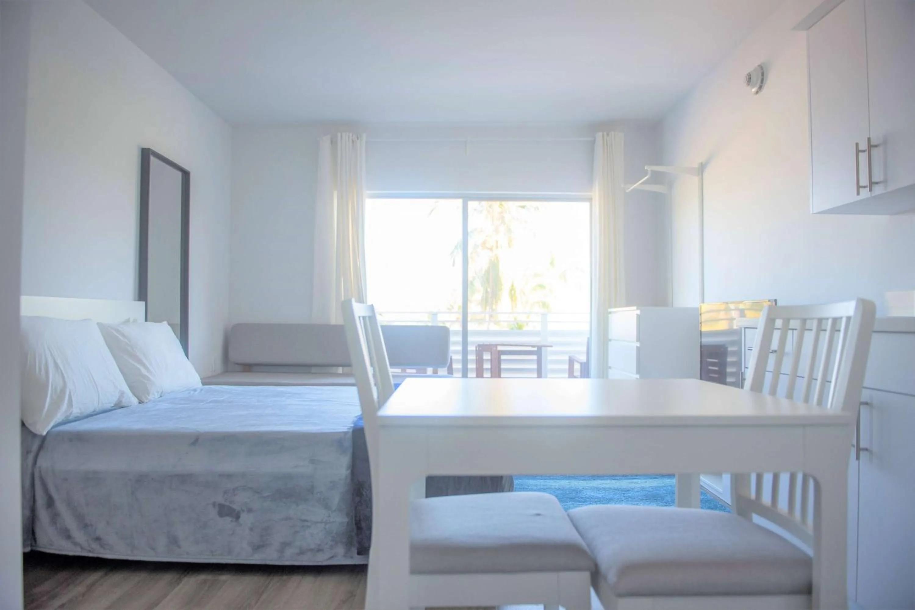 Photo of the whole room in 12th & Ocean Suites by LuxUrban