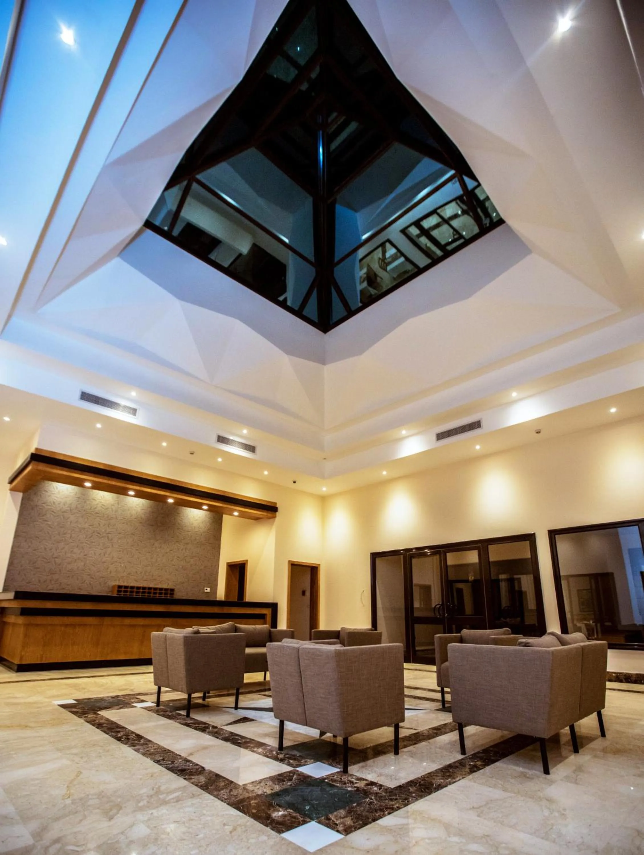 Lobby or reception in Sky View Suites Hotel