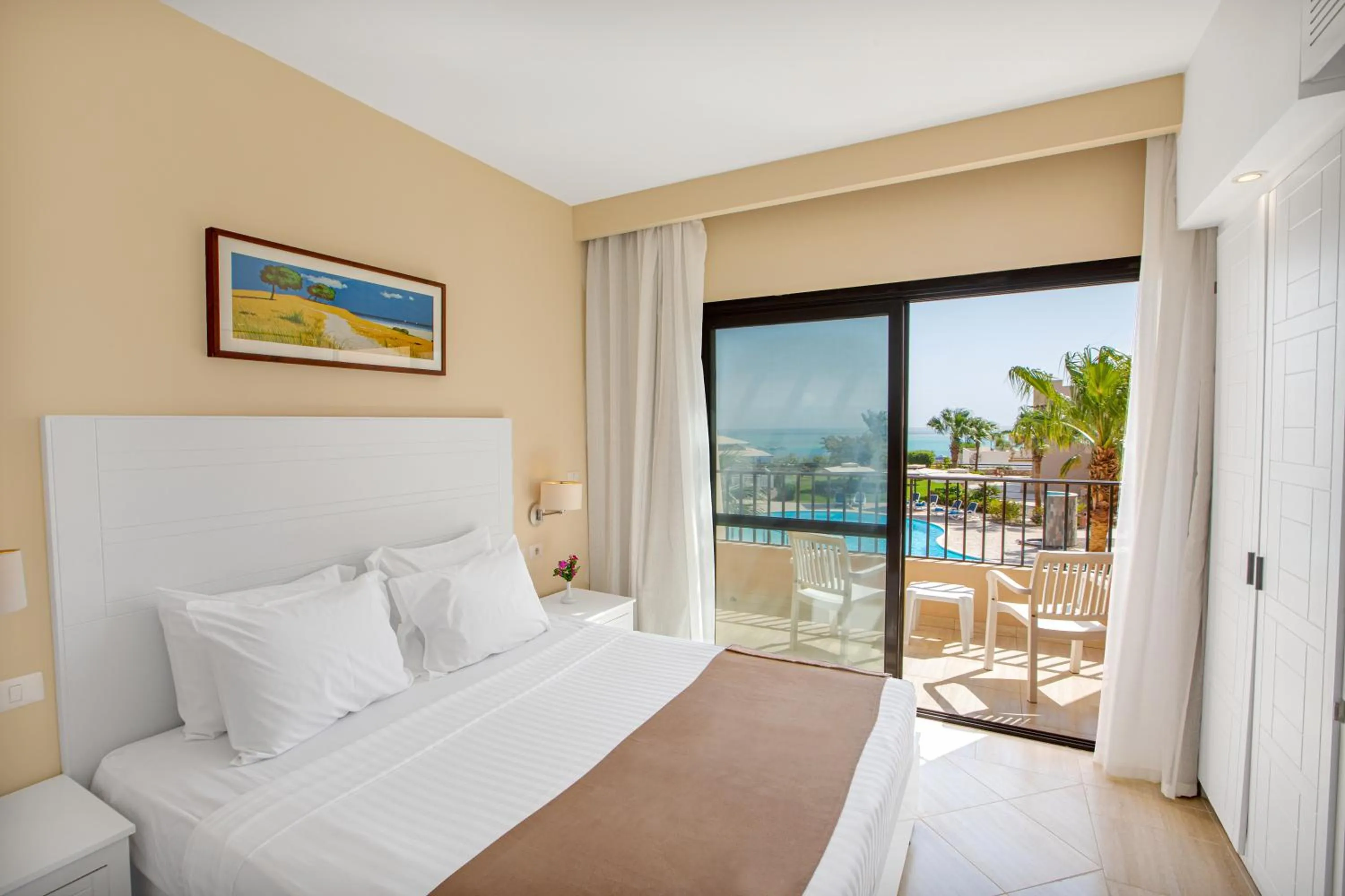 Bed in Sky View Suites Hotel