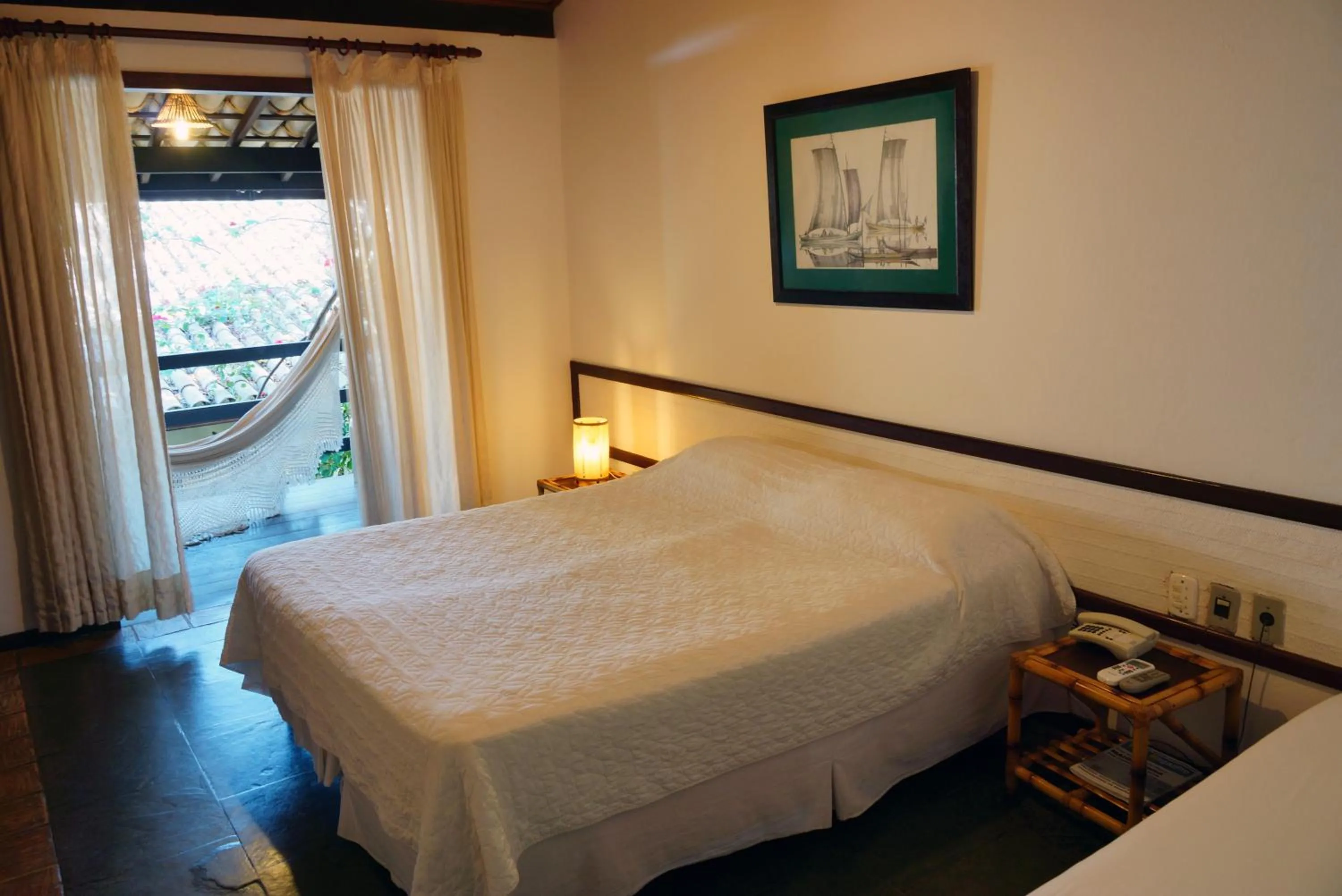 Bed in Pousada Ogum Marinho