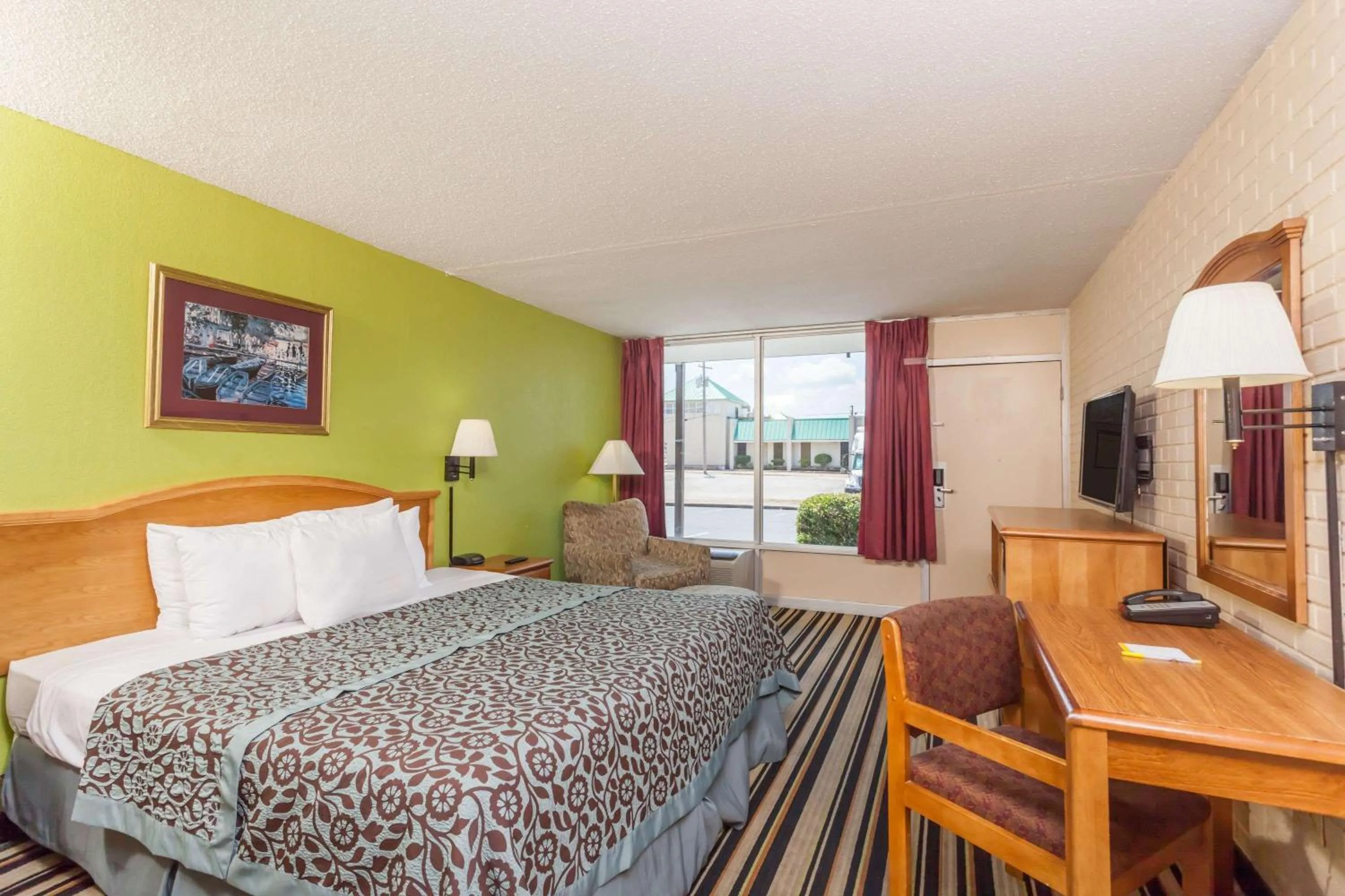 Photo of the whole room, Bed in Days Inn by Wyndham Jackson