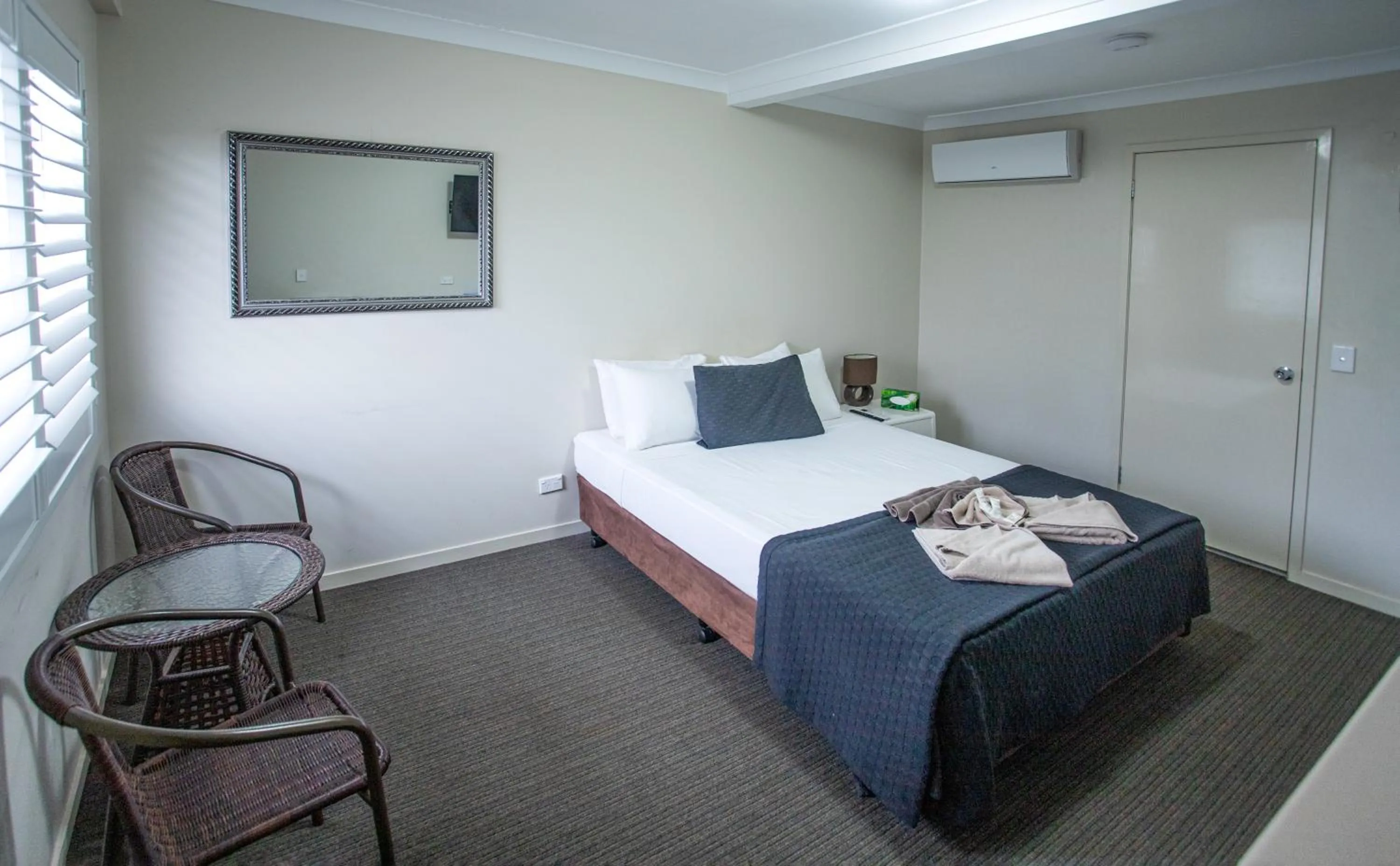 Bed in Tropicana Motel