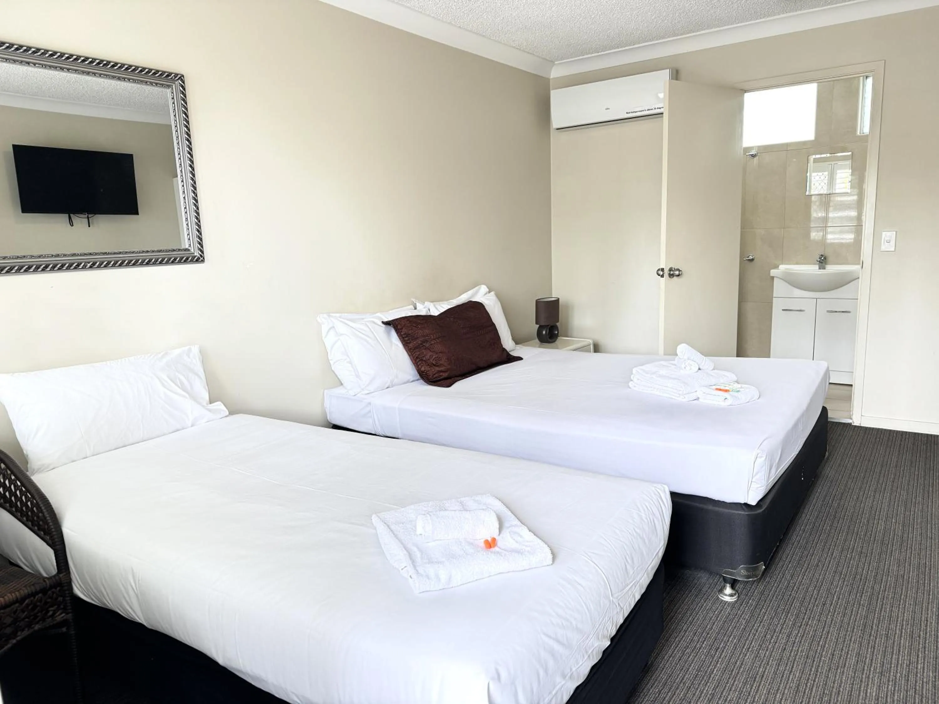 Bed in Tropicana Motel