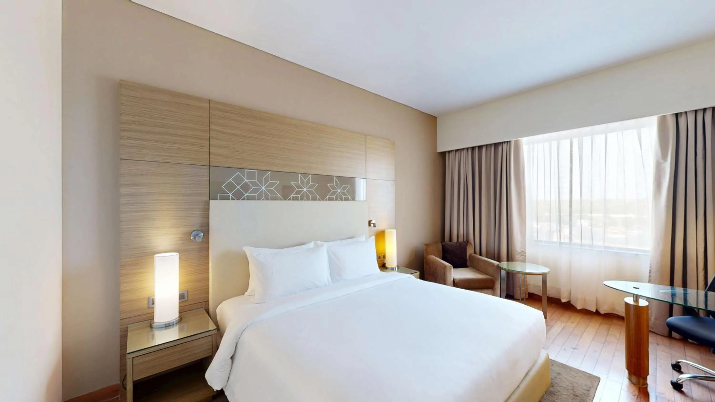Bedroom, Bed in Radisson Gurugram Udyog Vihar