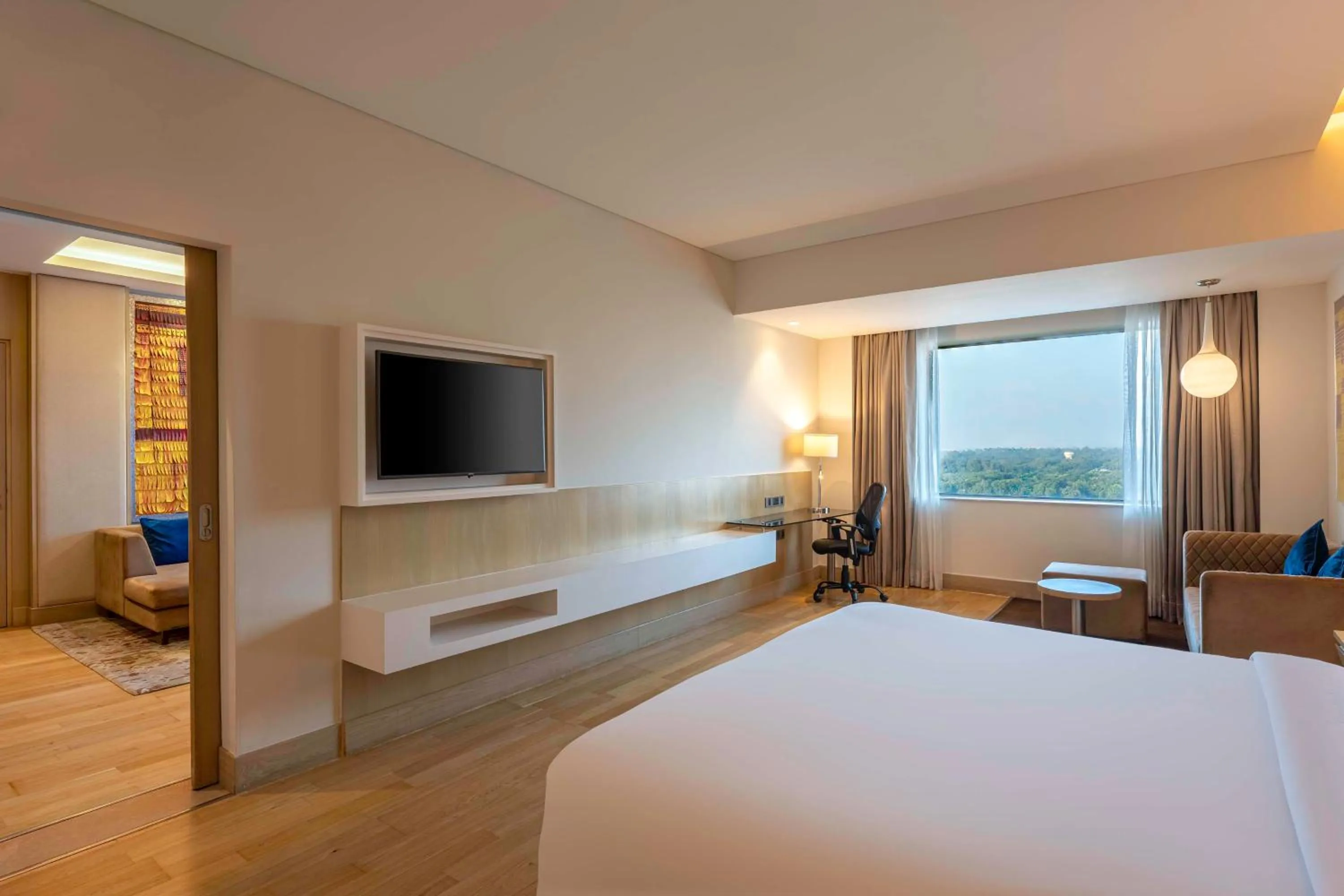 Photo of the whole room, Bed in Radisson Gurugram Udyog Vihar