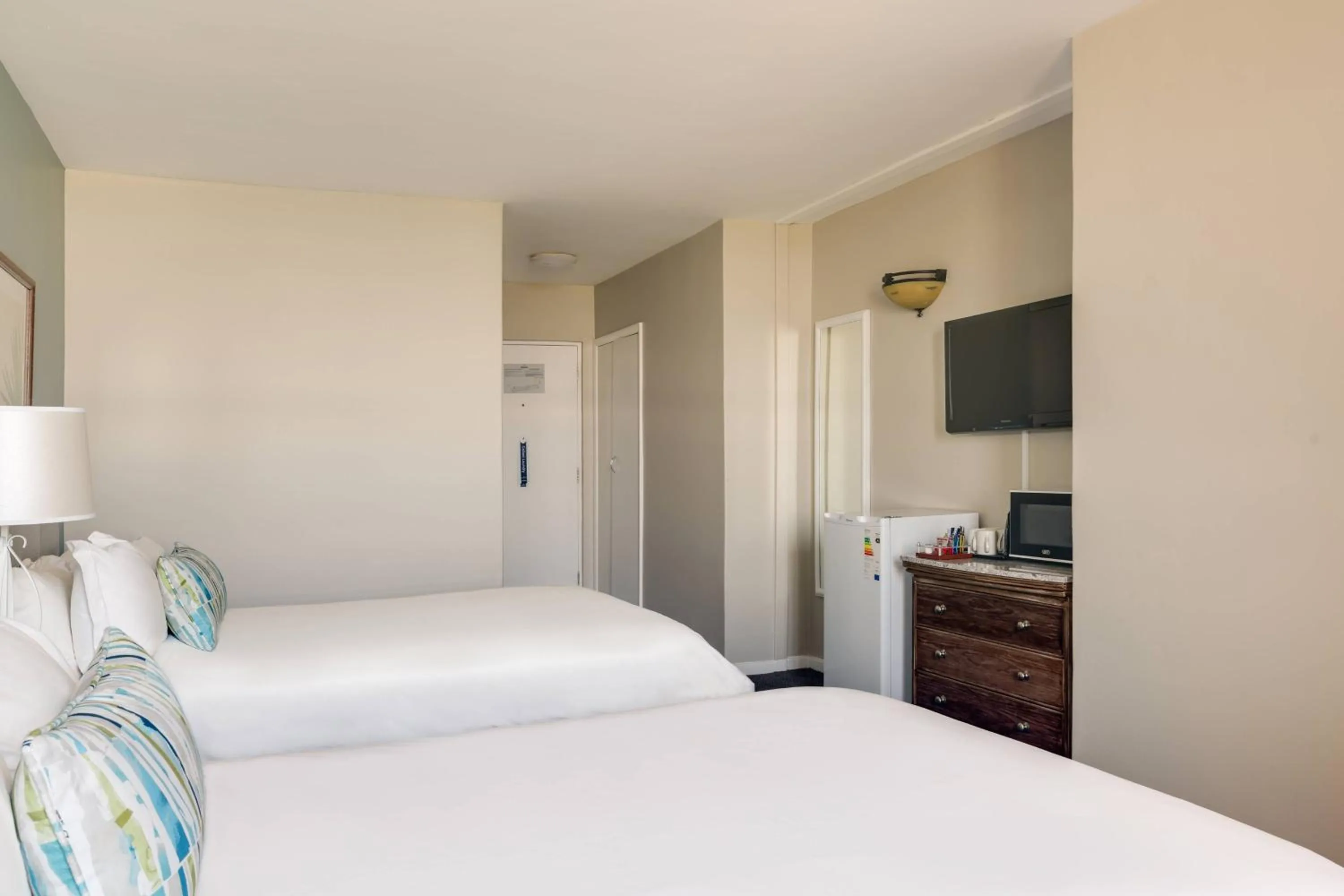 Photo of the whole room, Bed in Protea Hotel by Marriott Karridene Beach