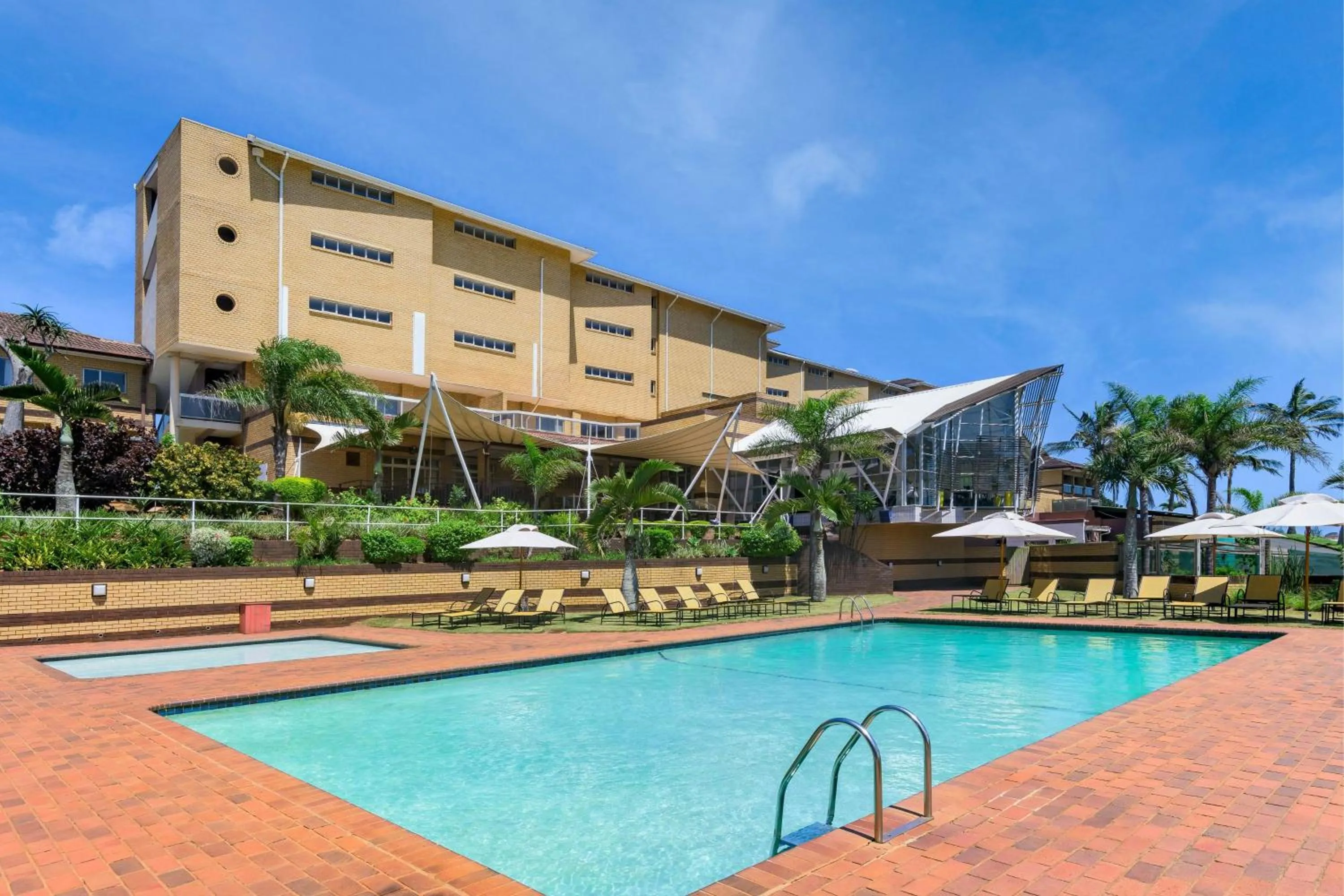 Swimming pool in Protea Hotel by Marriott Karridene Beach