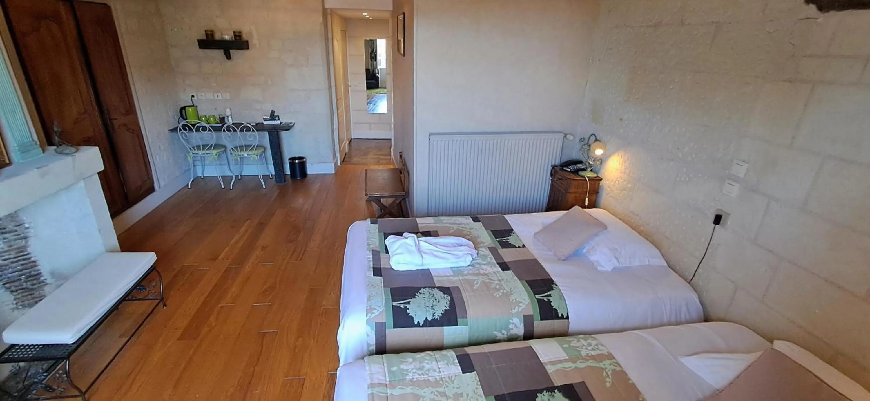 Bed in Logis Hôtel Le Bussy