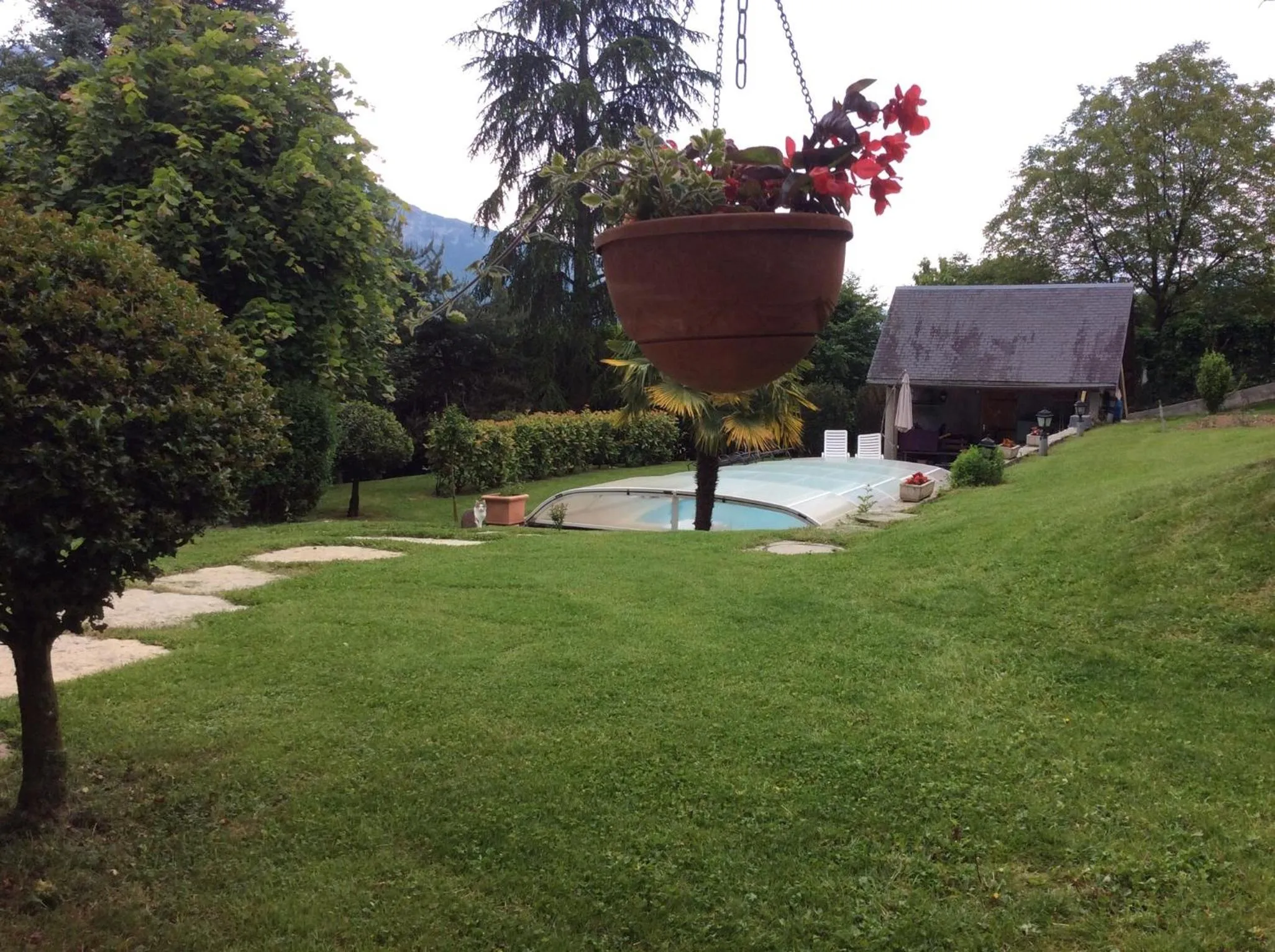 Garden in Demeure d'hôtes Les Irisynes