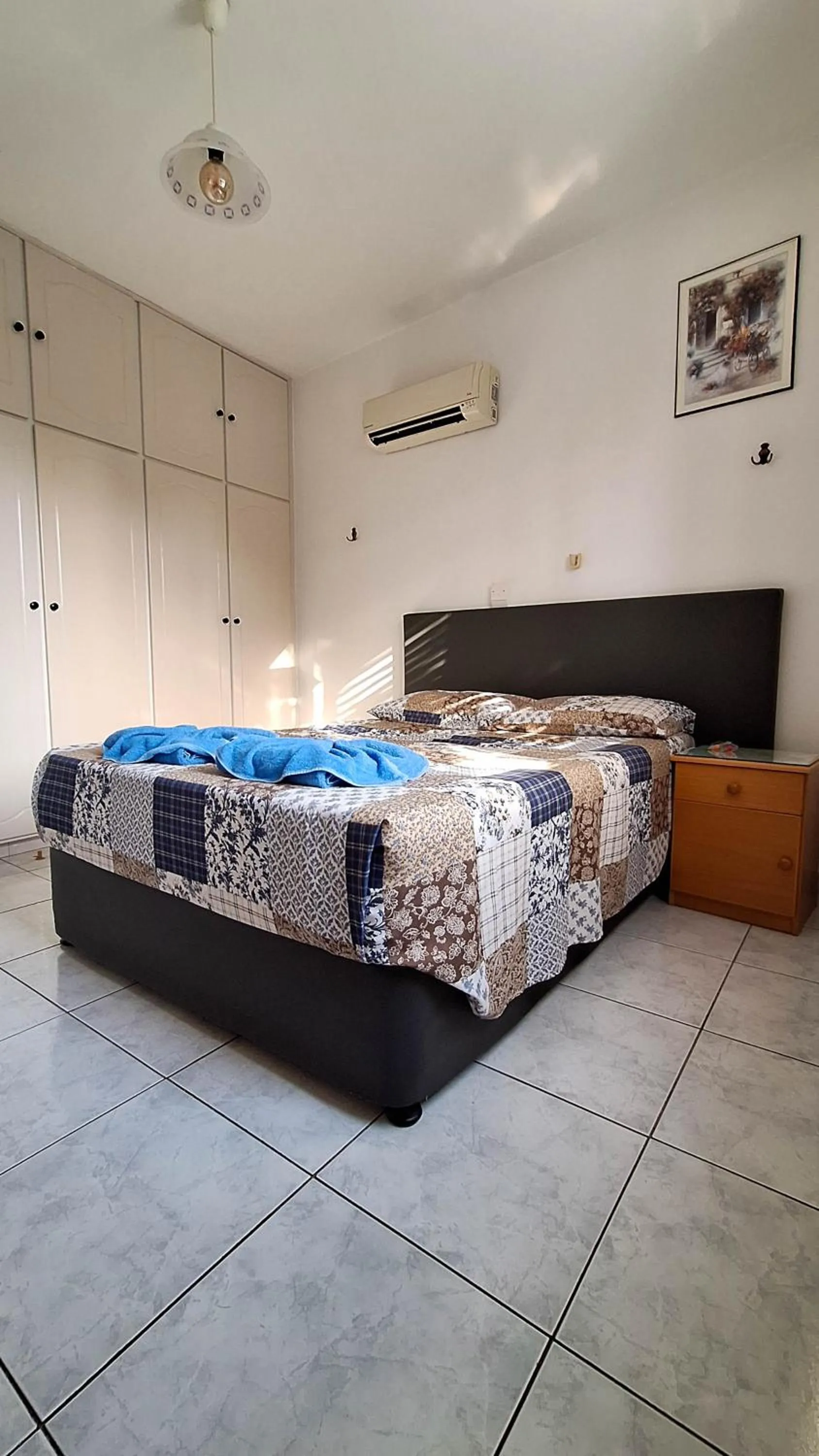 Bed in Apollonia Hotel Apartments