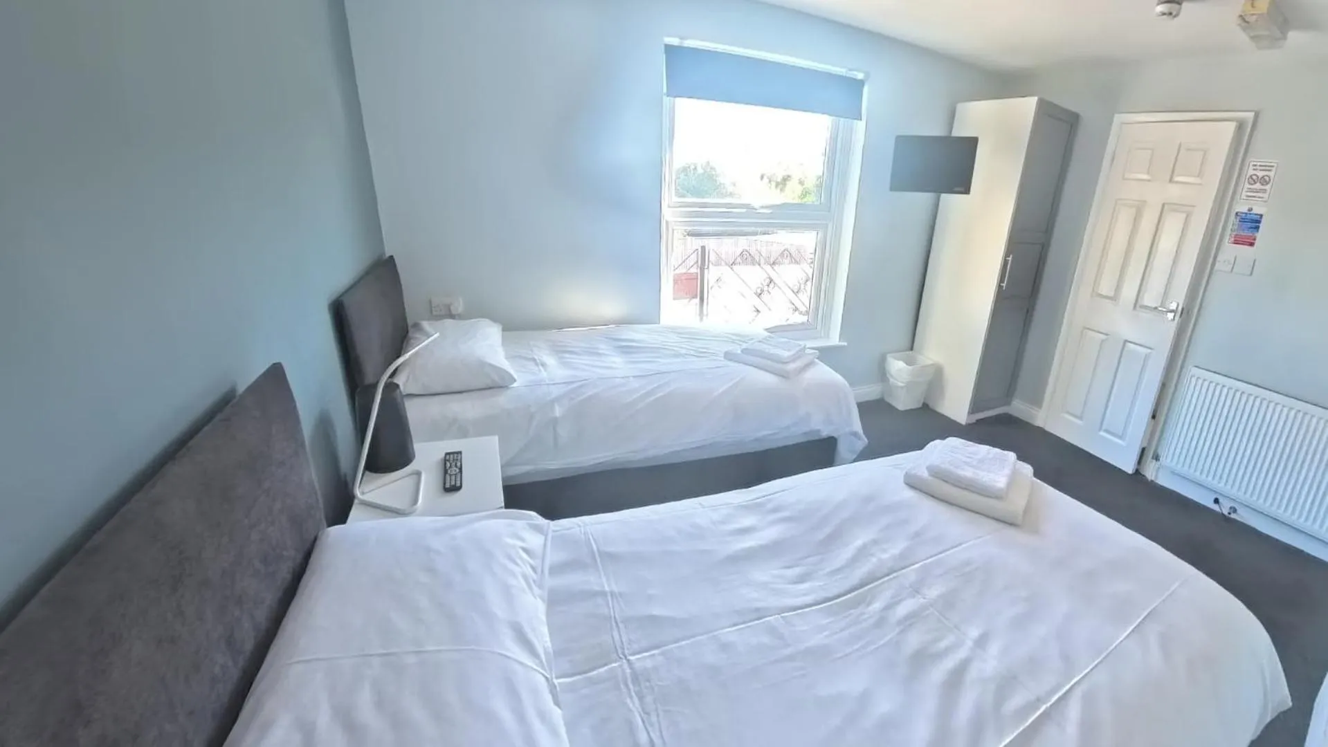 Photo of the whole room, Bed in The Riverside