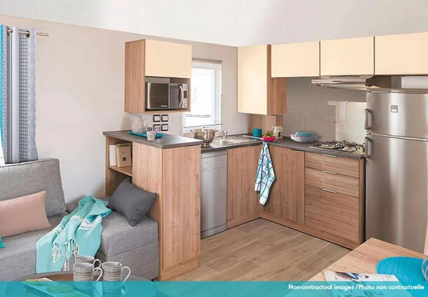 Kitchen or kitchenette in Camping Officiel Siblu Les Rives de Condrieu
