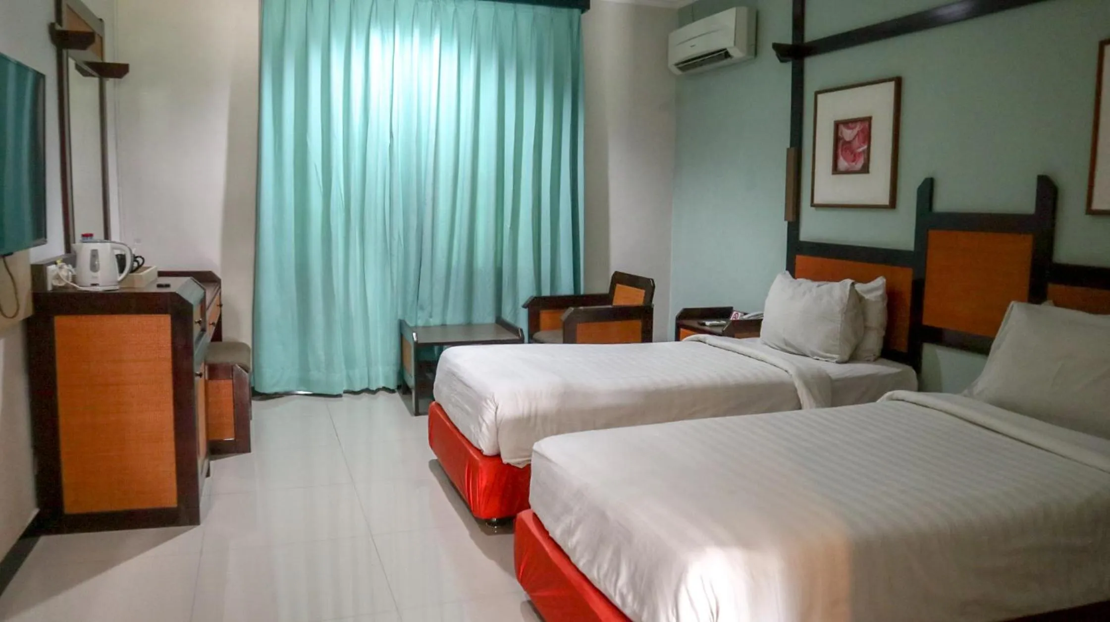 Photo of the whole room, Bed in Hotel Sofia Juanda Surabaya