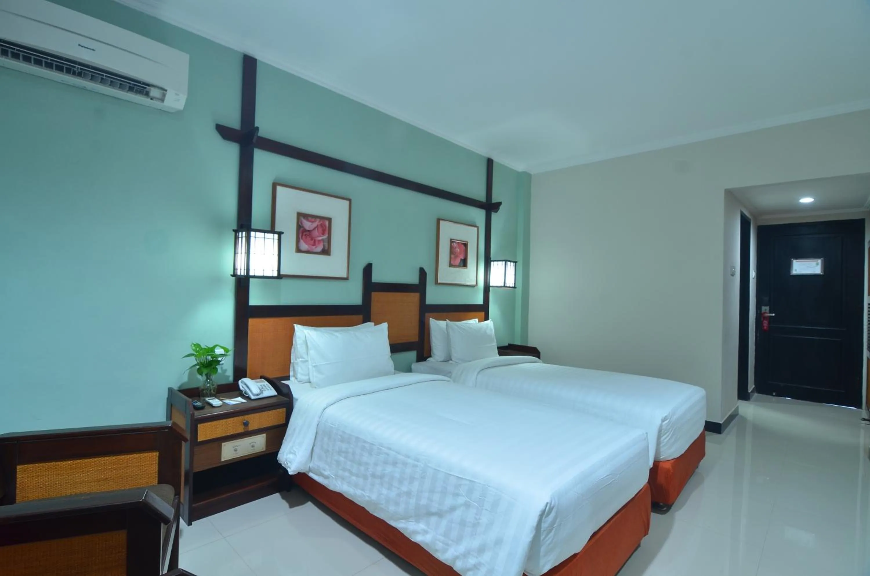 Bed in Hotel Sofia Juanda Surabaya