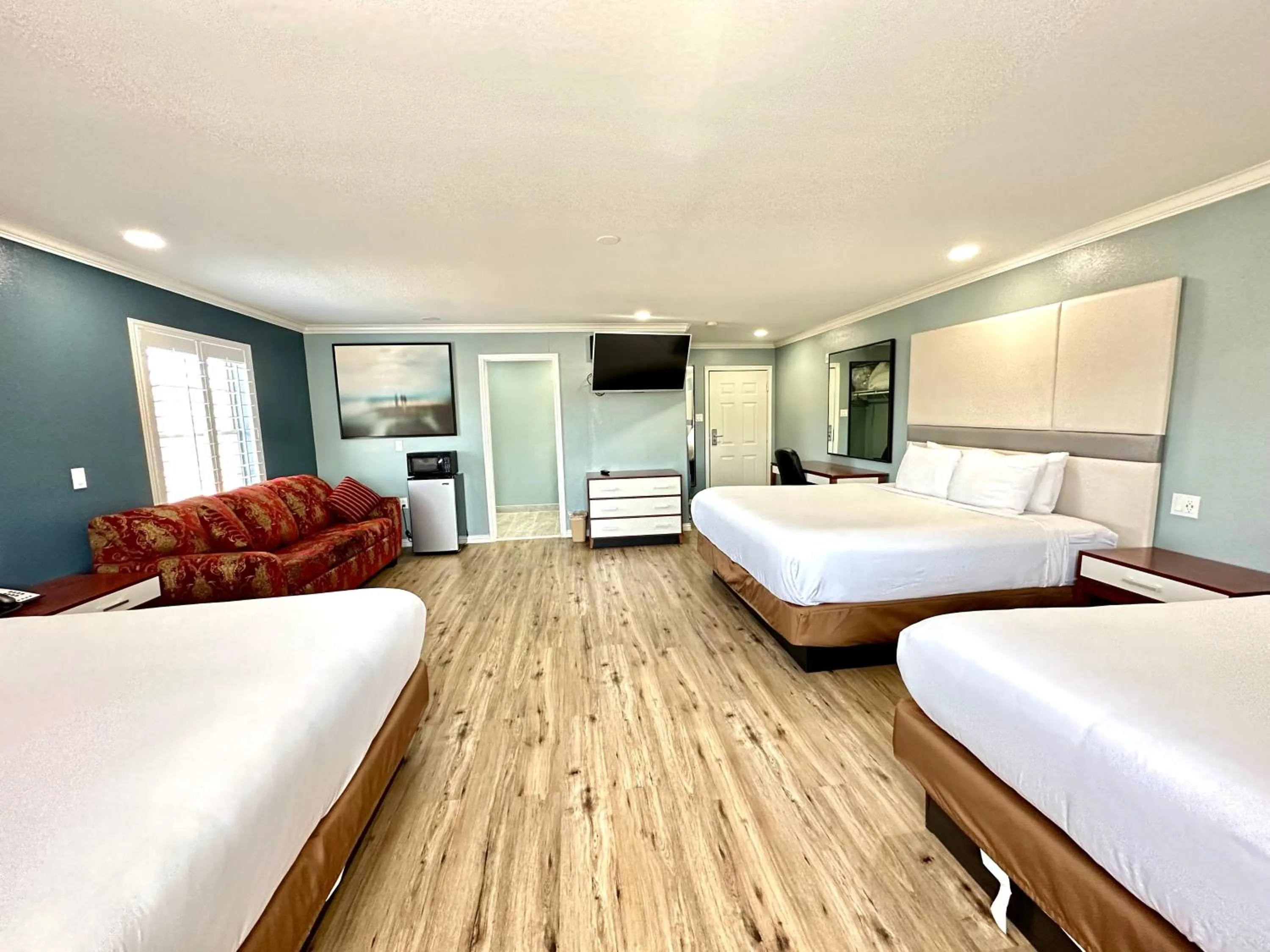 Bed in Executive Inn & Suites Magnolia