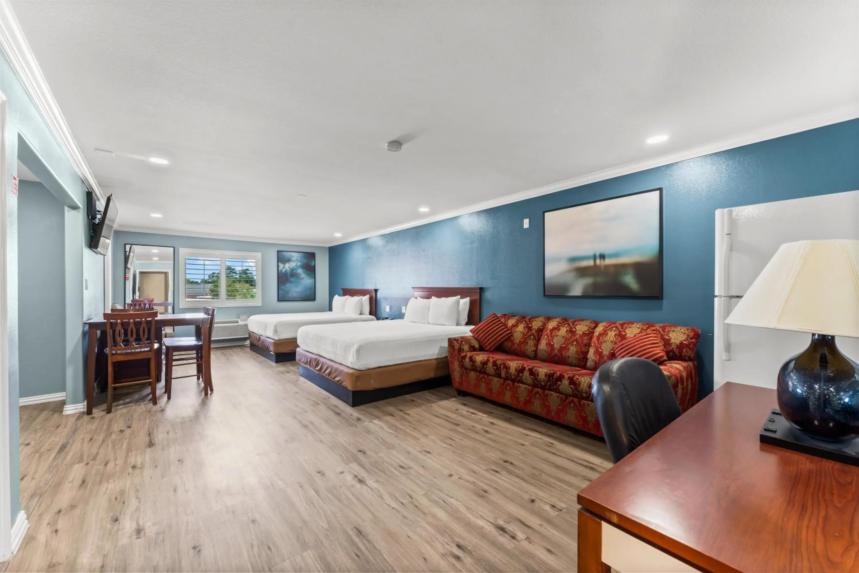 Bed in Executive Inn & Suites Magnolia