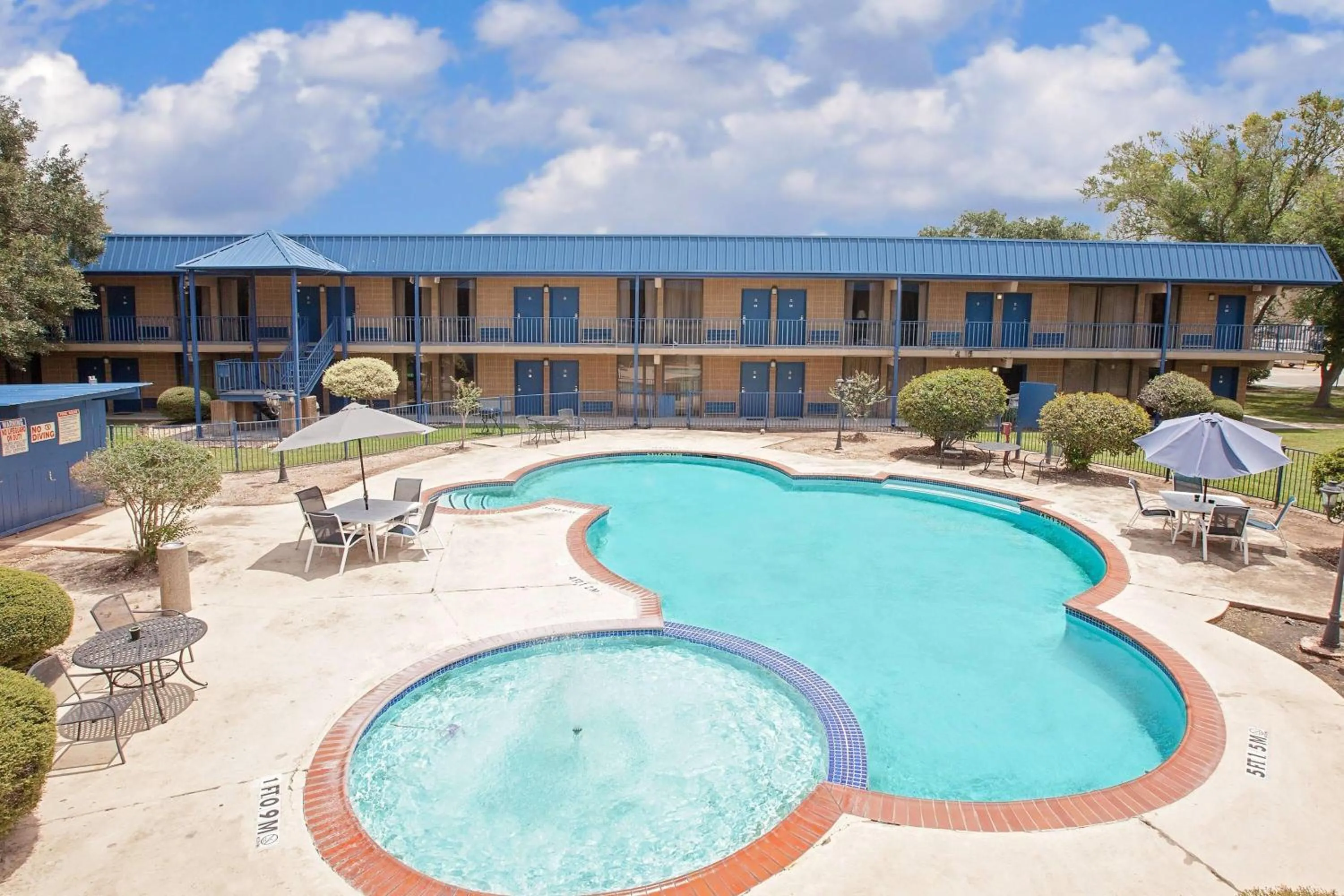 Pool view in Days Inn by Wyndham Bay City