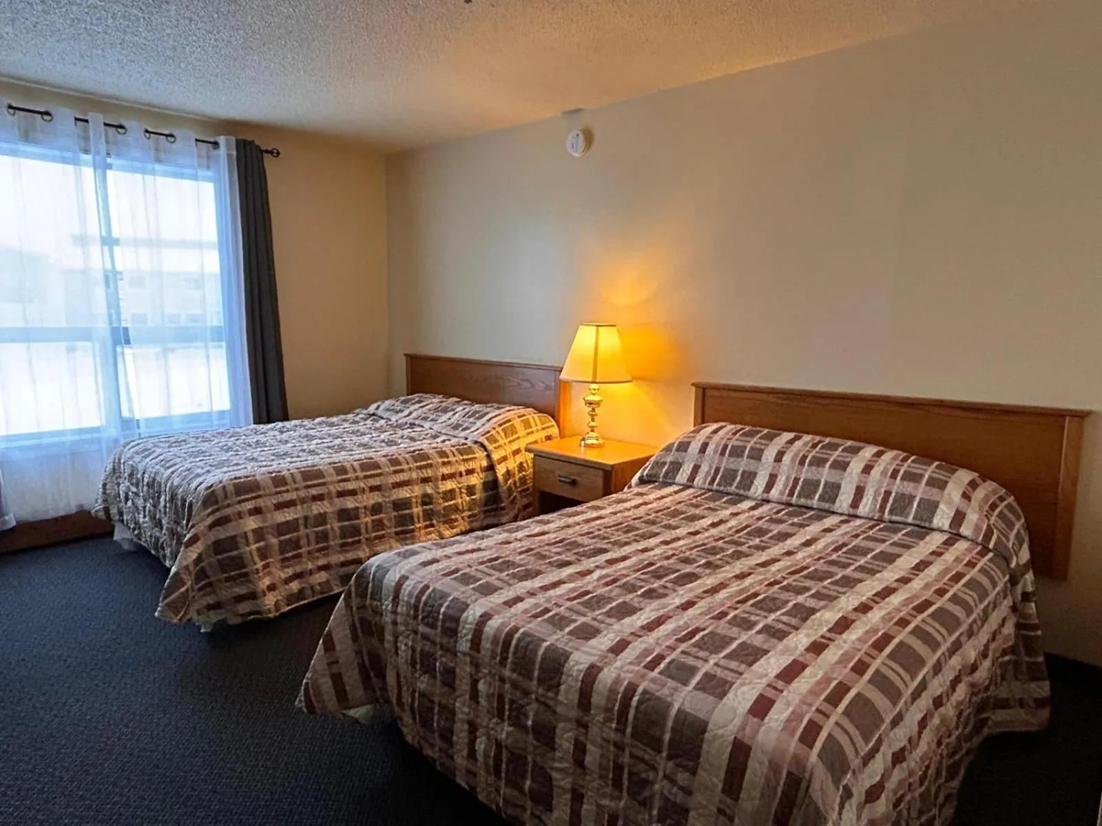 Bed in Discovery Inn