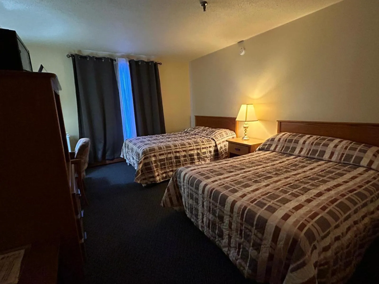 Bed in Discovery Inn