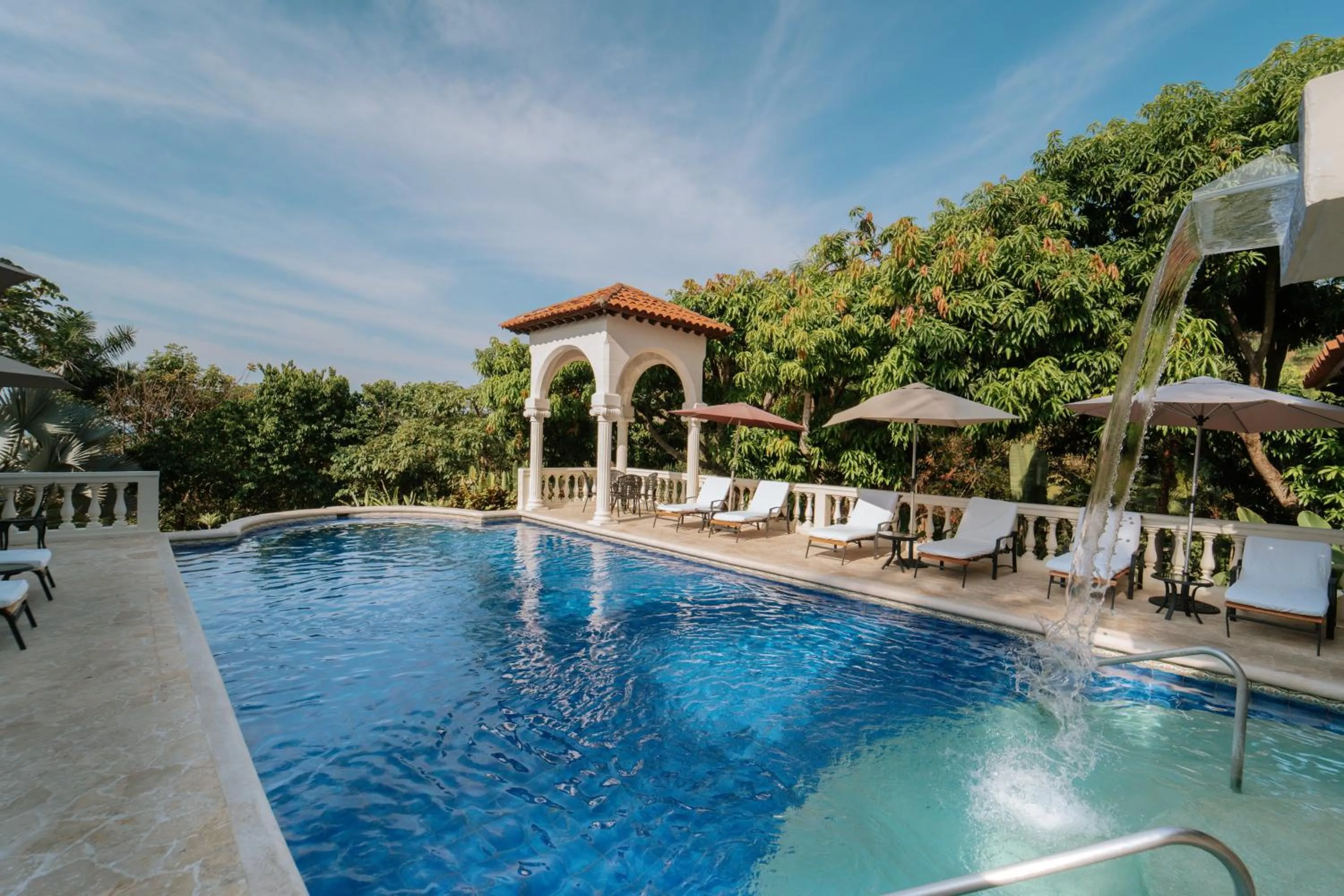 Swimming pool in Parador Nature Resort and Spa