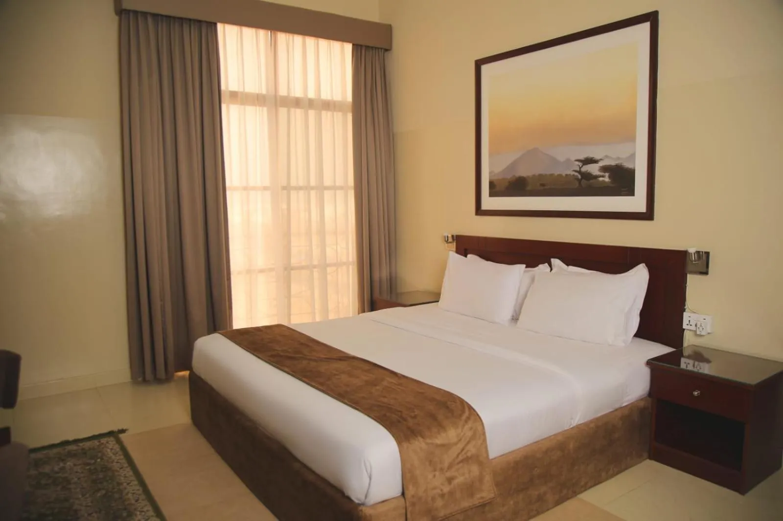 Bed in Al Ayjah Plaza Hotel
