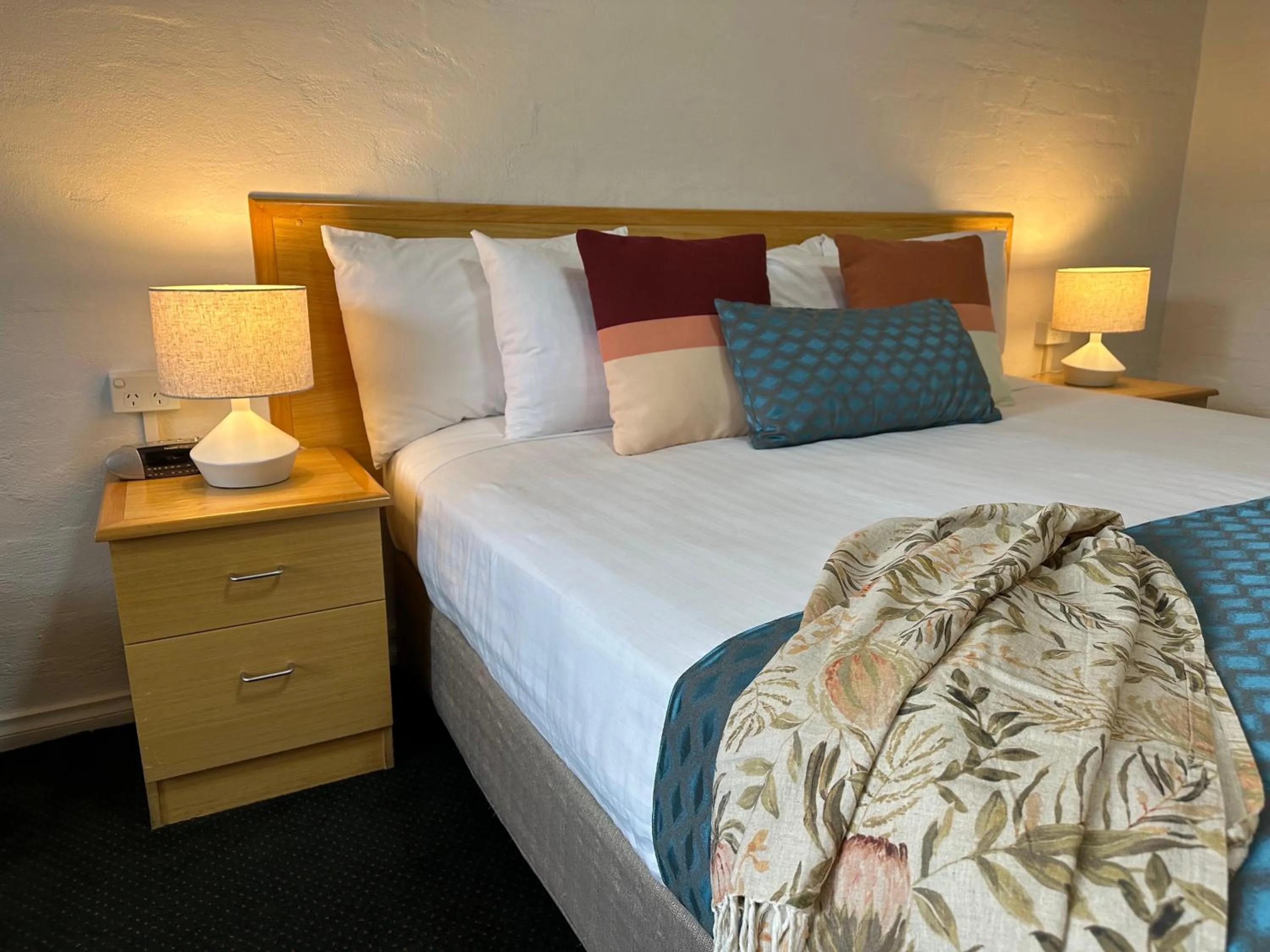 Bed in Grand Country Lodge Motel