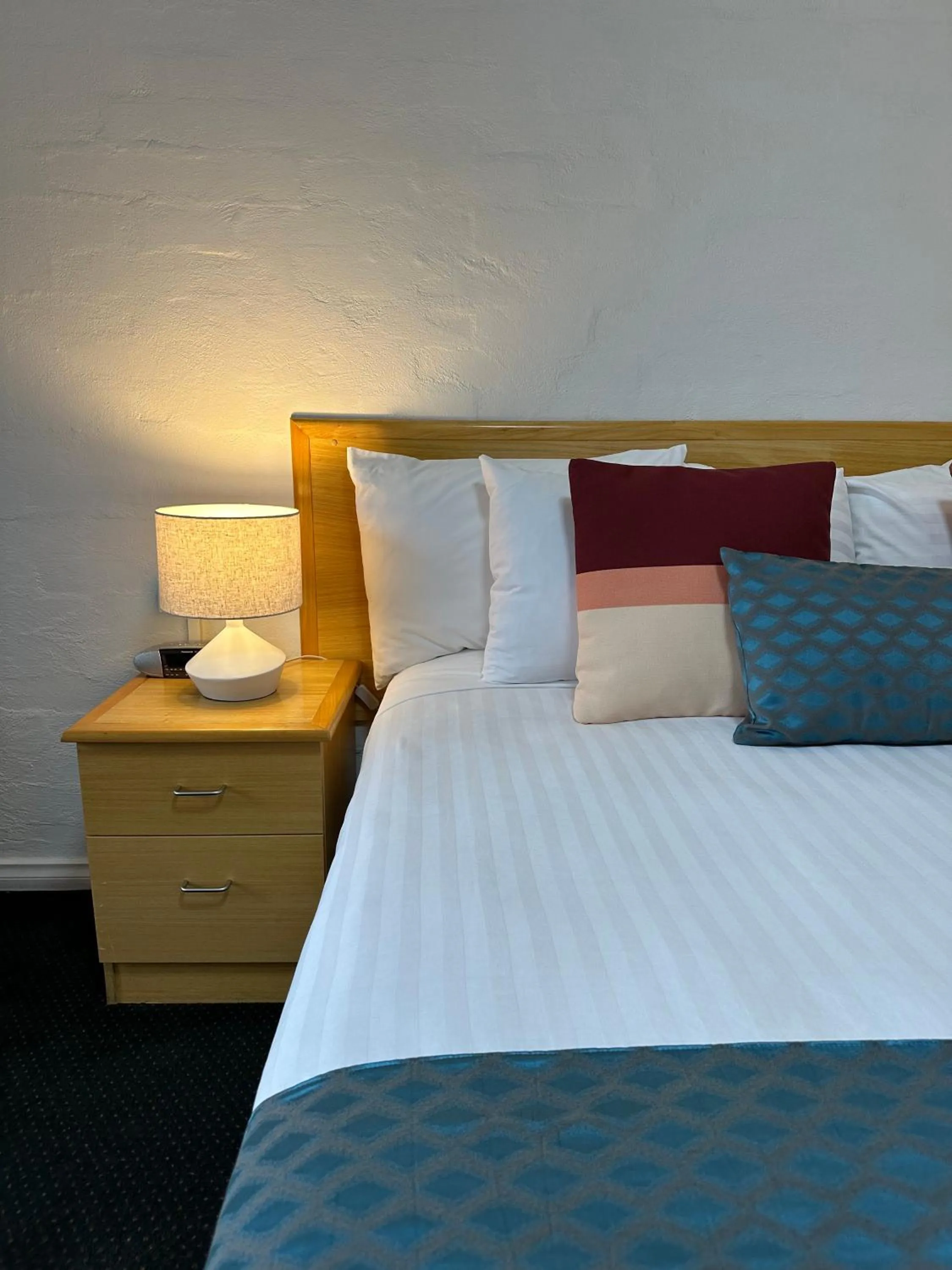 Bedroom, Bed in Grand Country Lodge Motel