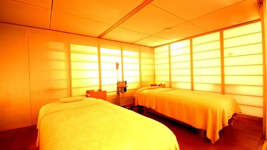 Bed in Hotel Okuyumoto