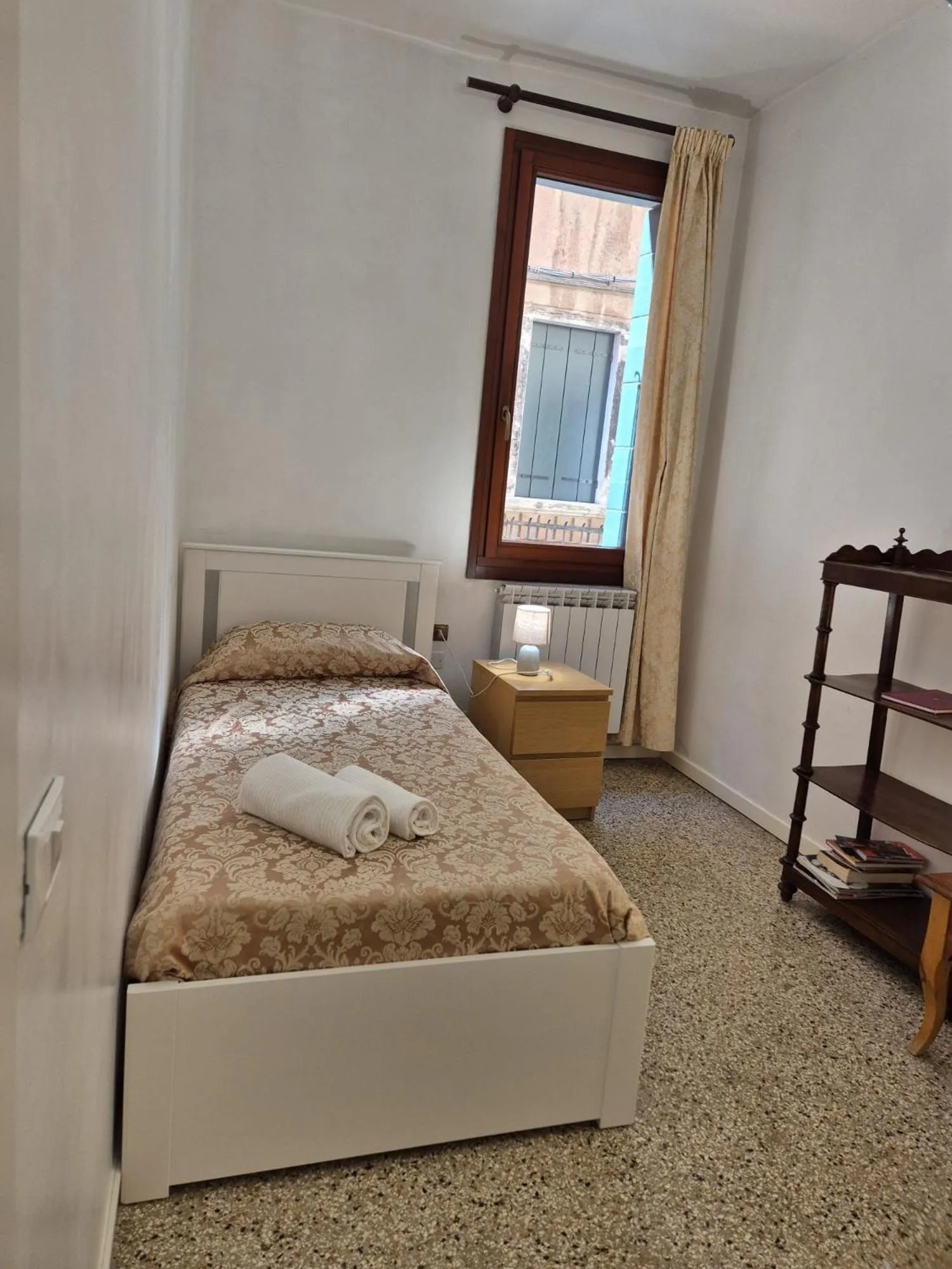 Bed in Prince Apartments