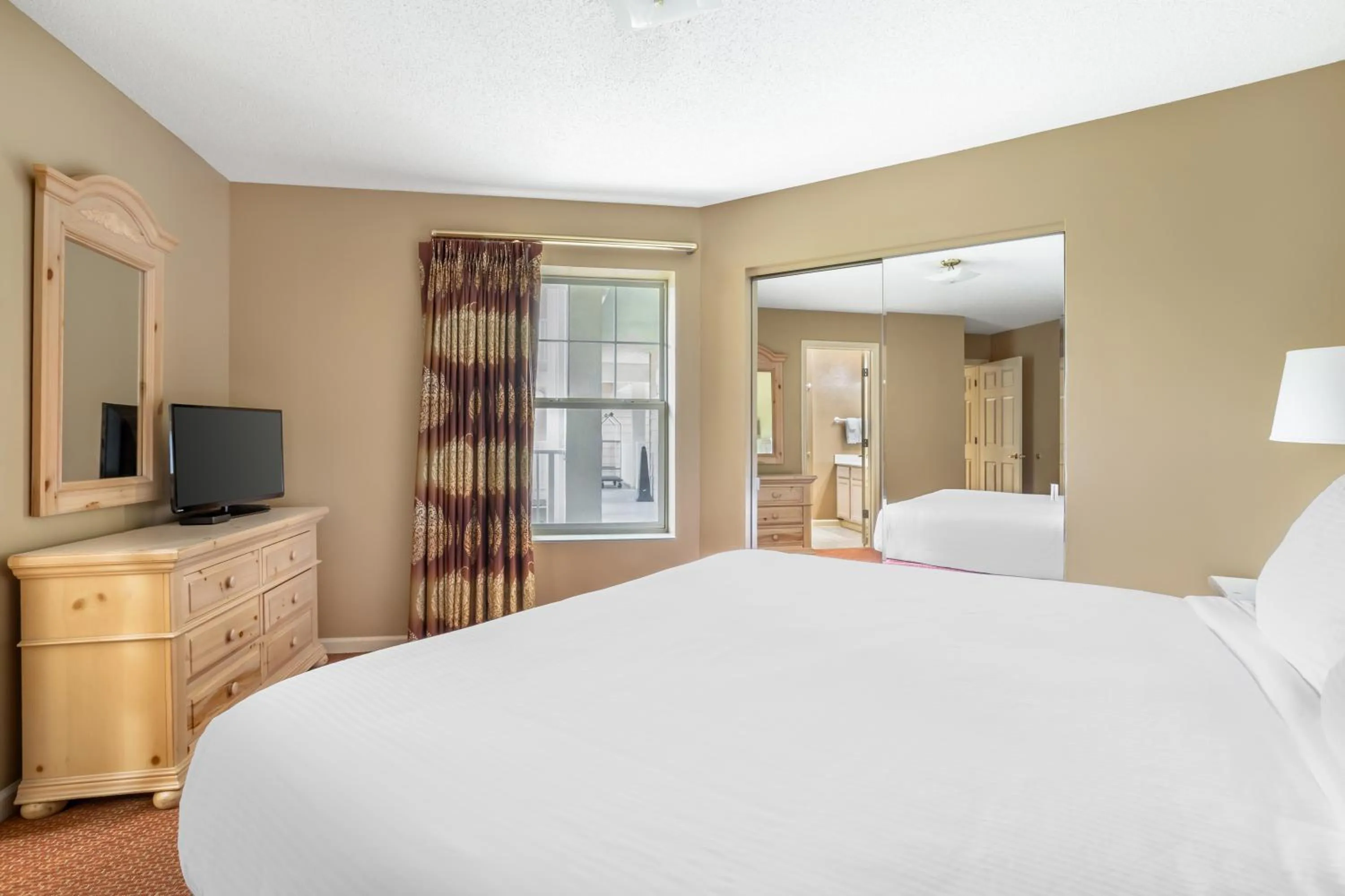 Bed in Sunrise Ridge Resort