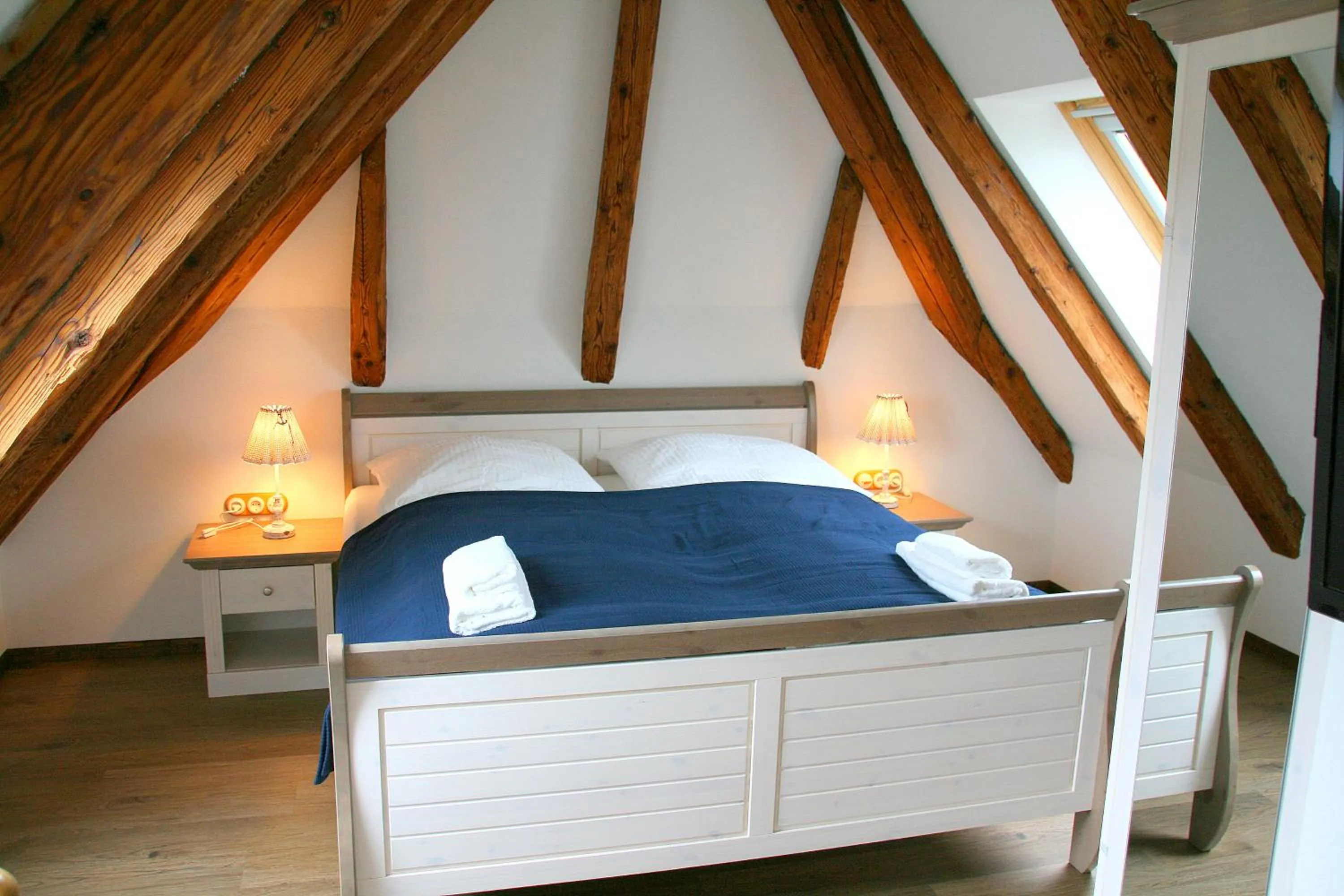 Bed in Waldvogel Ferienzimmer klimatisiert