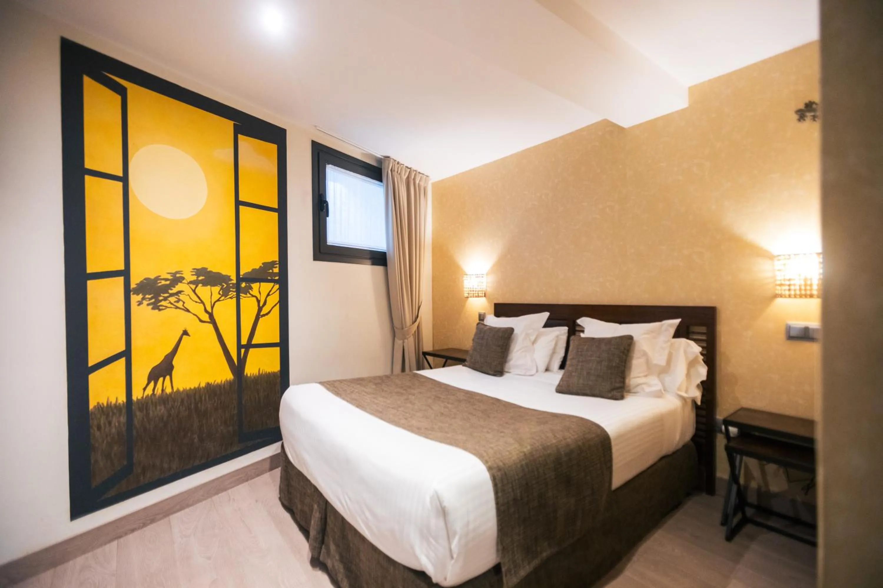 Bed in Le Petit Boutique Hotel