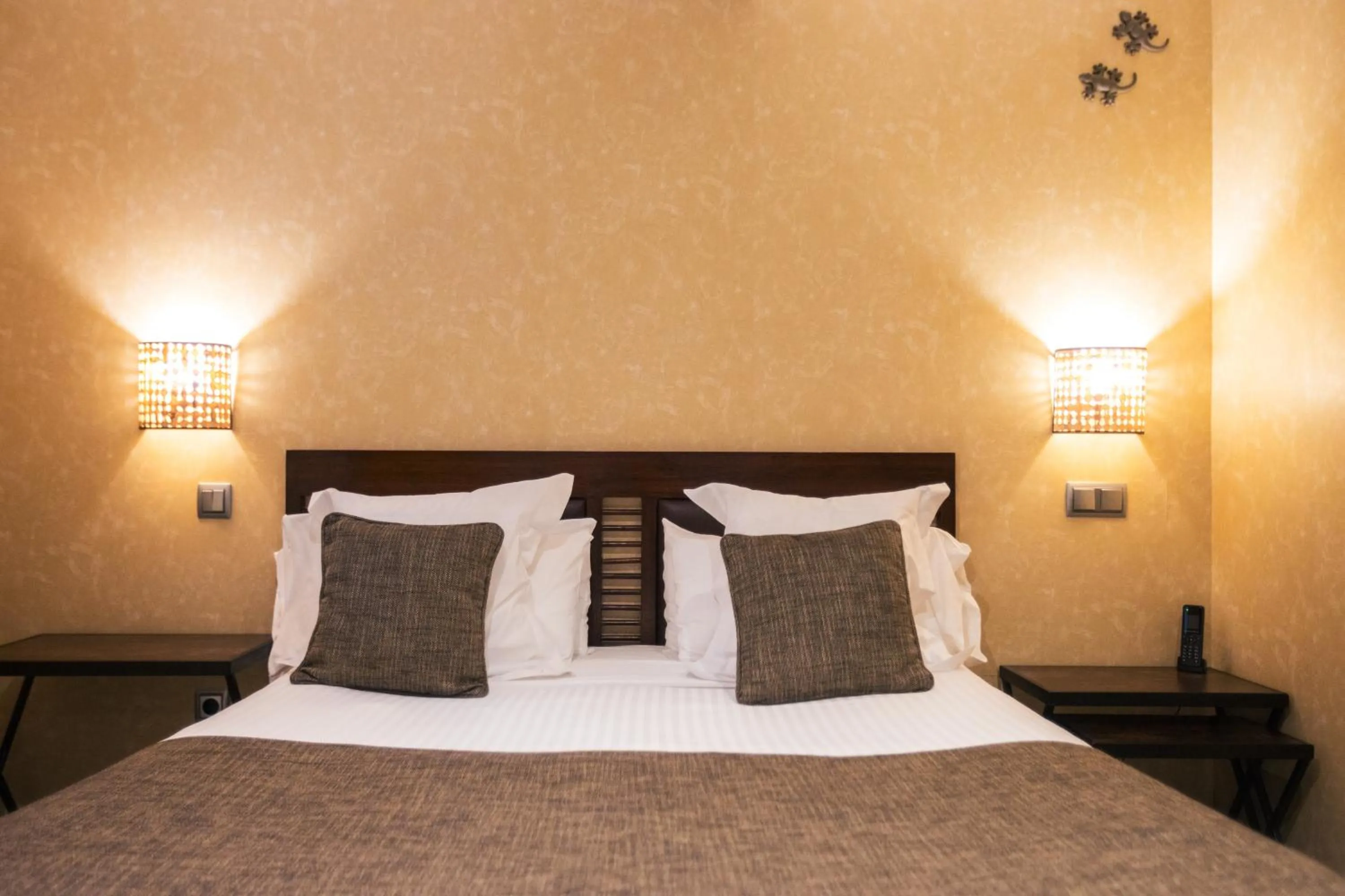 Bed in Le Petit Boutique Hotel