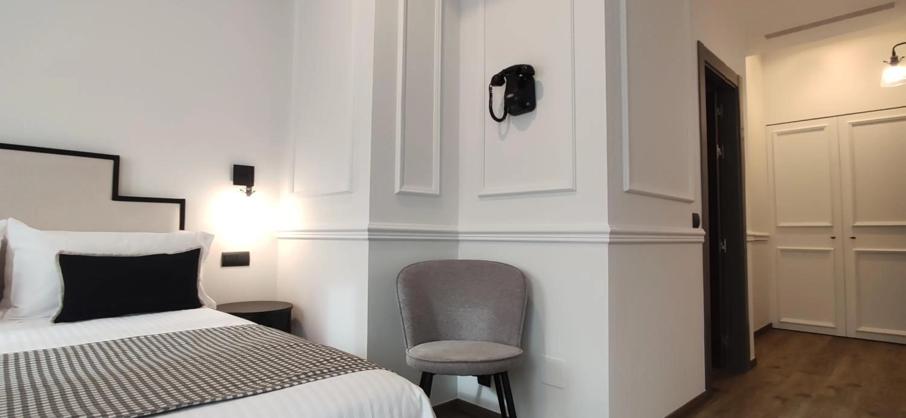 Bed in Le Petit Boutique Hotel