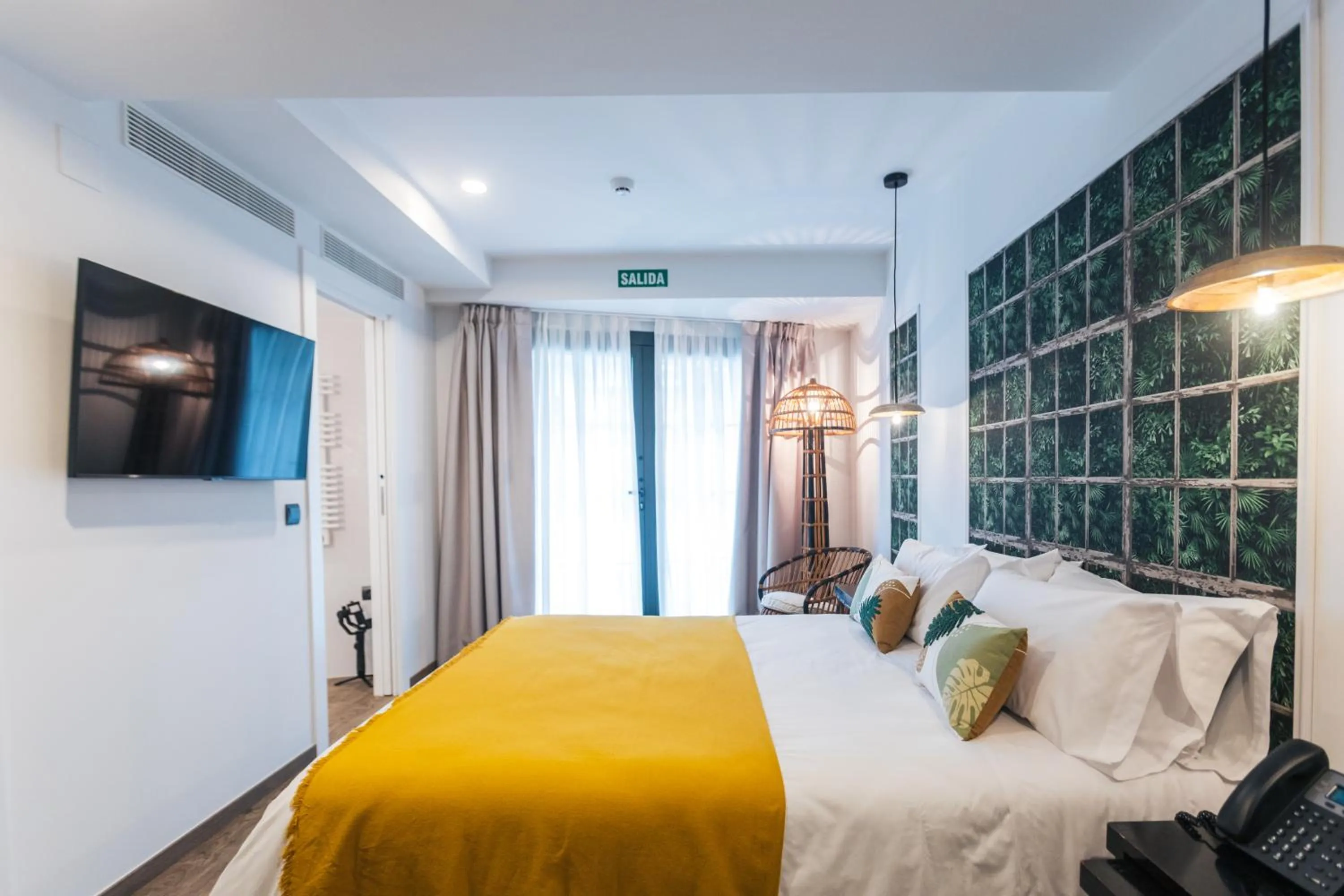 Bed in Le Petit Boutique Hotel