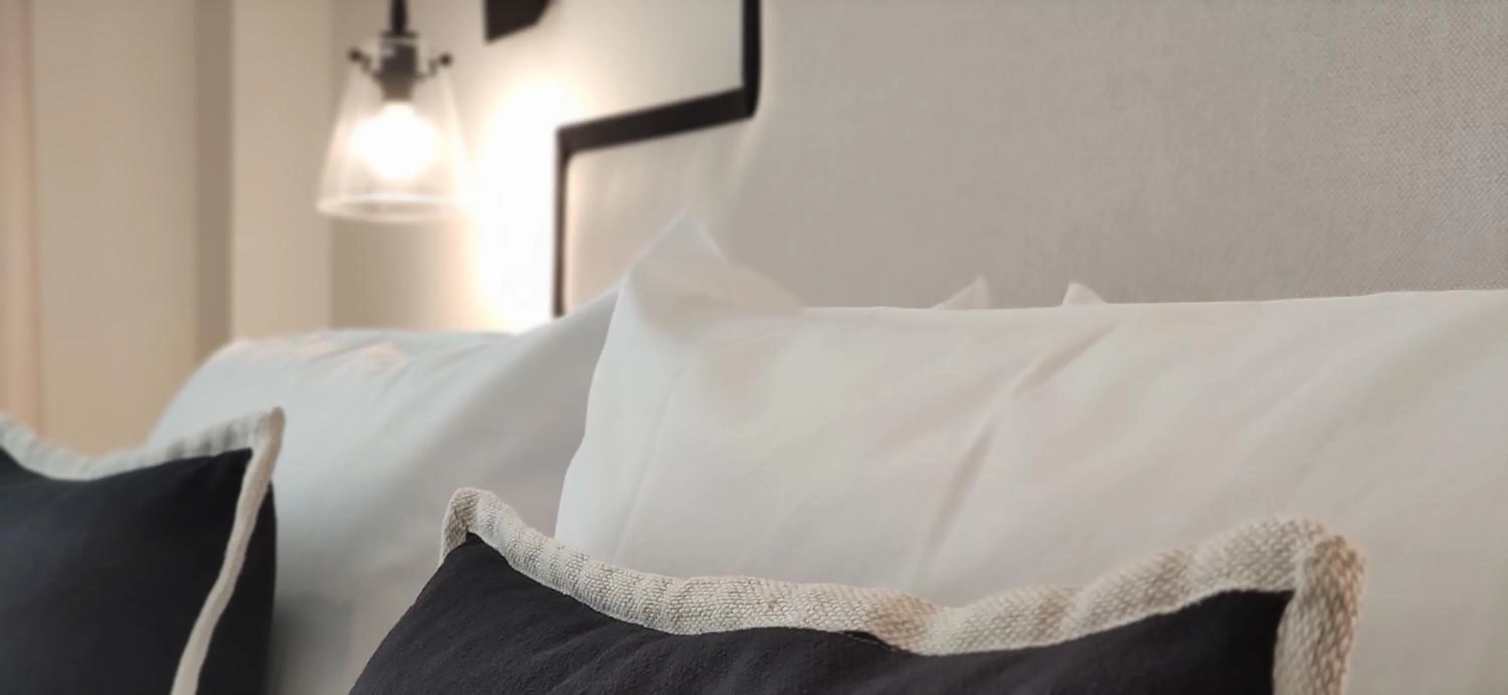 Bed in Le Petit Boutique Hotel