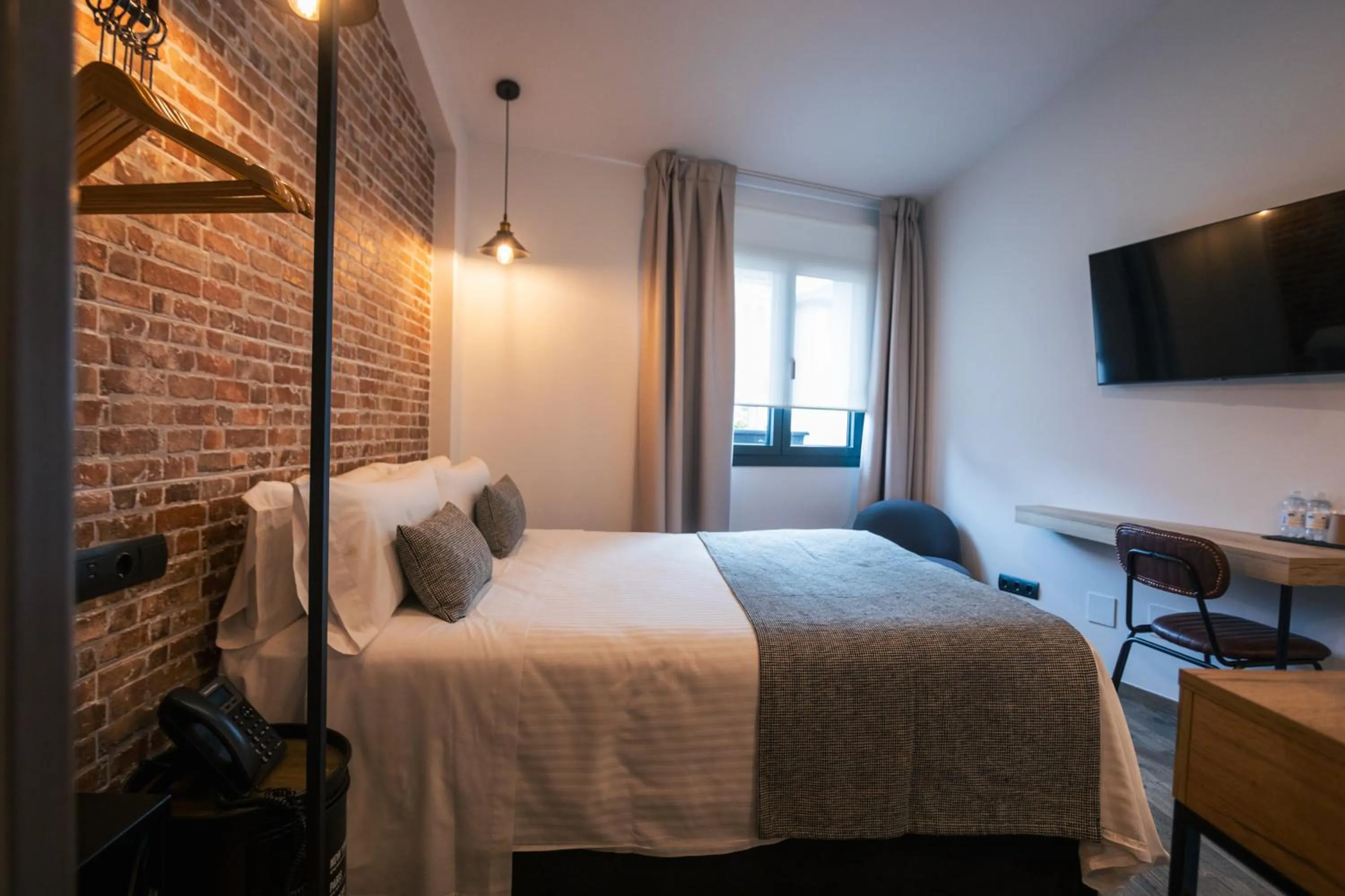 Bed in Le Petit Boutique Hotel