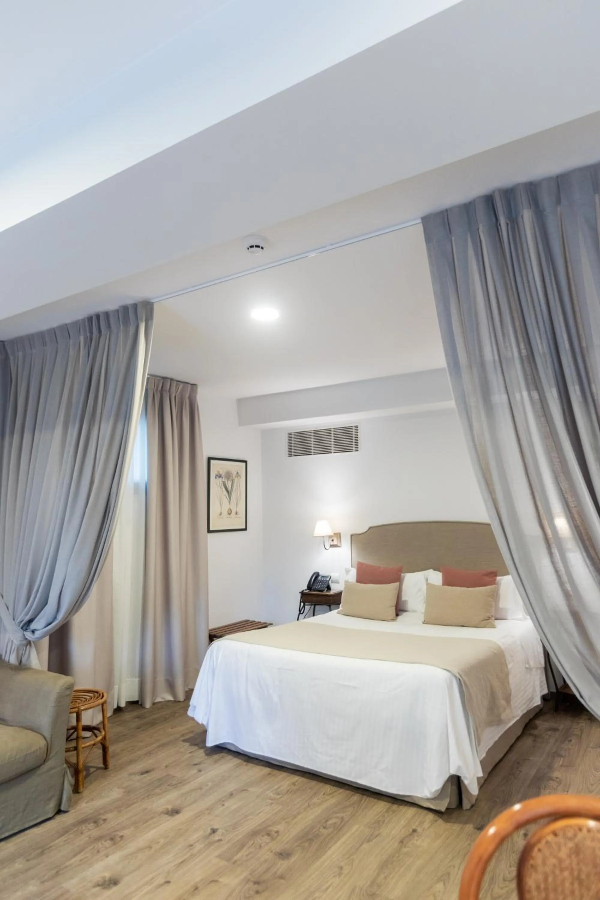 Bed in Le Petit Boutique Hotel