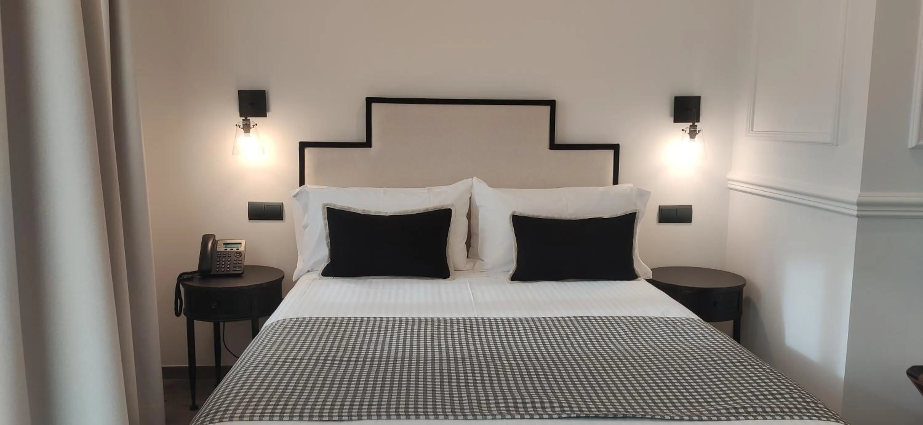 Bed in Le Petit Boutique Hotel